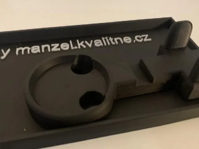 Držák páky kávovaru