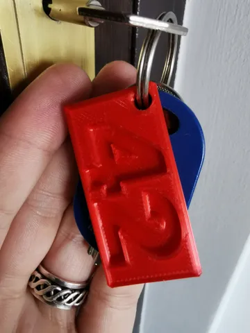 The Hitchhiker's Guide to the Galaxy - 42 Keychain