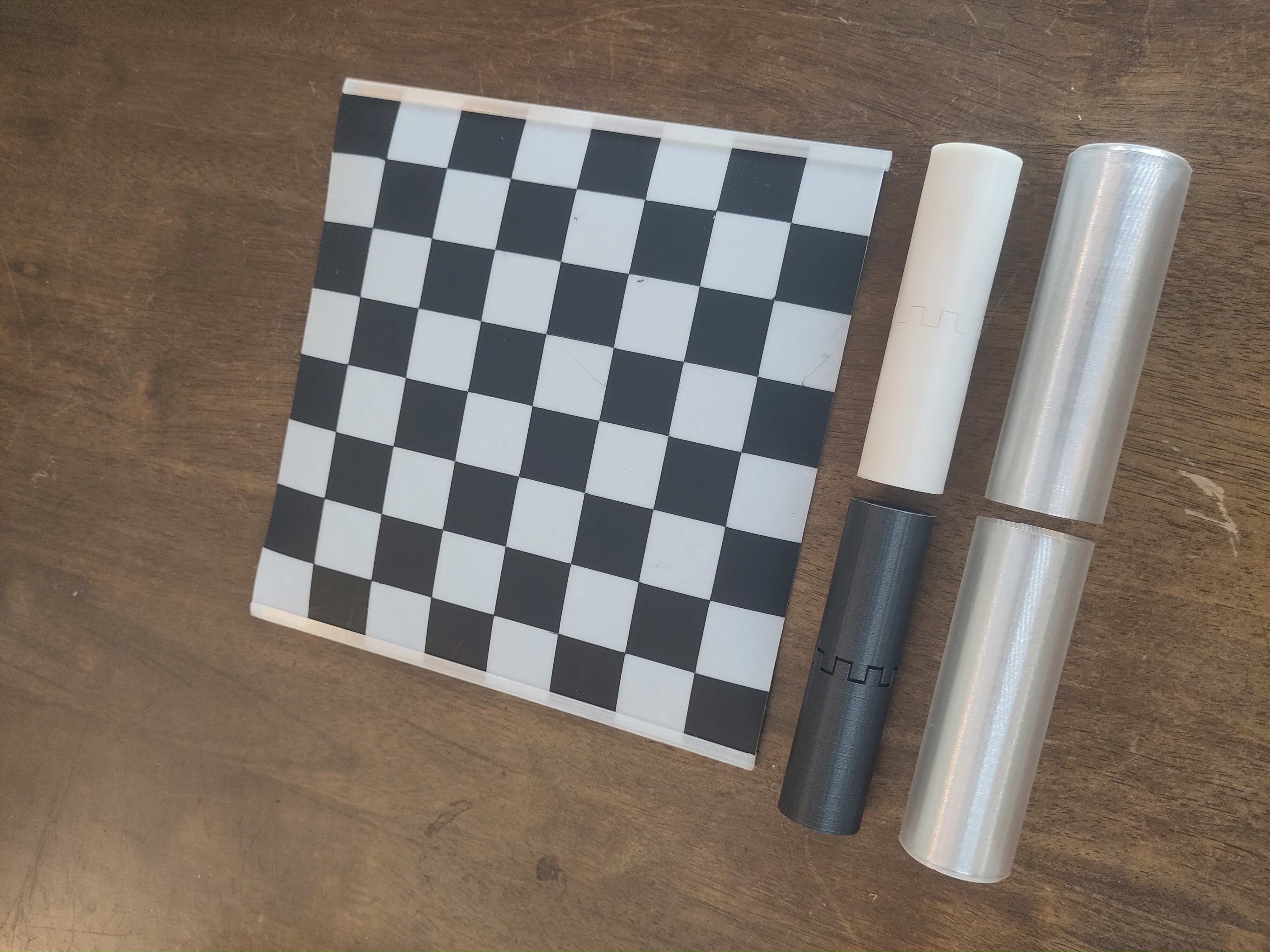 Rollable Chessboard (TPU) with sleeves / caps and guide rails for ultracompact chess set