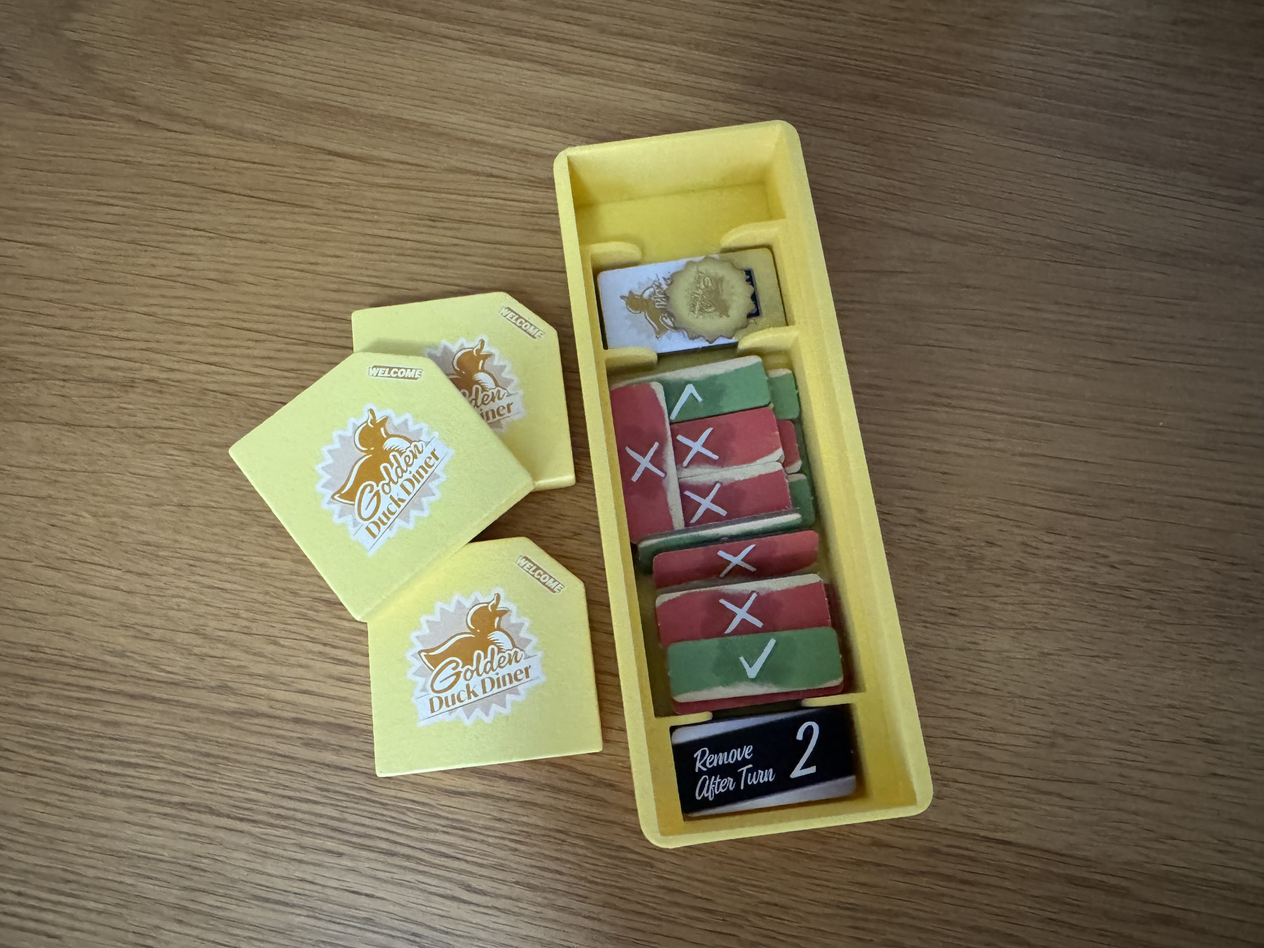 Player tray with drive-in compartment