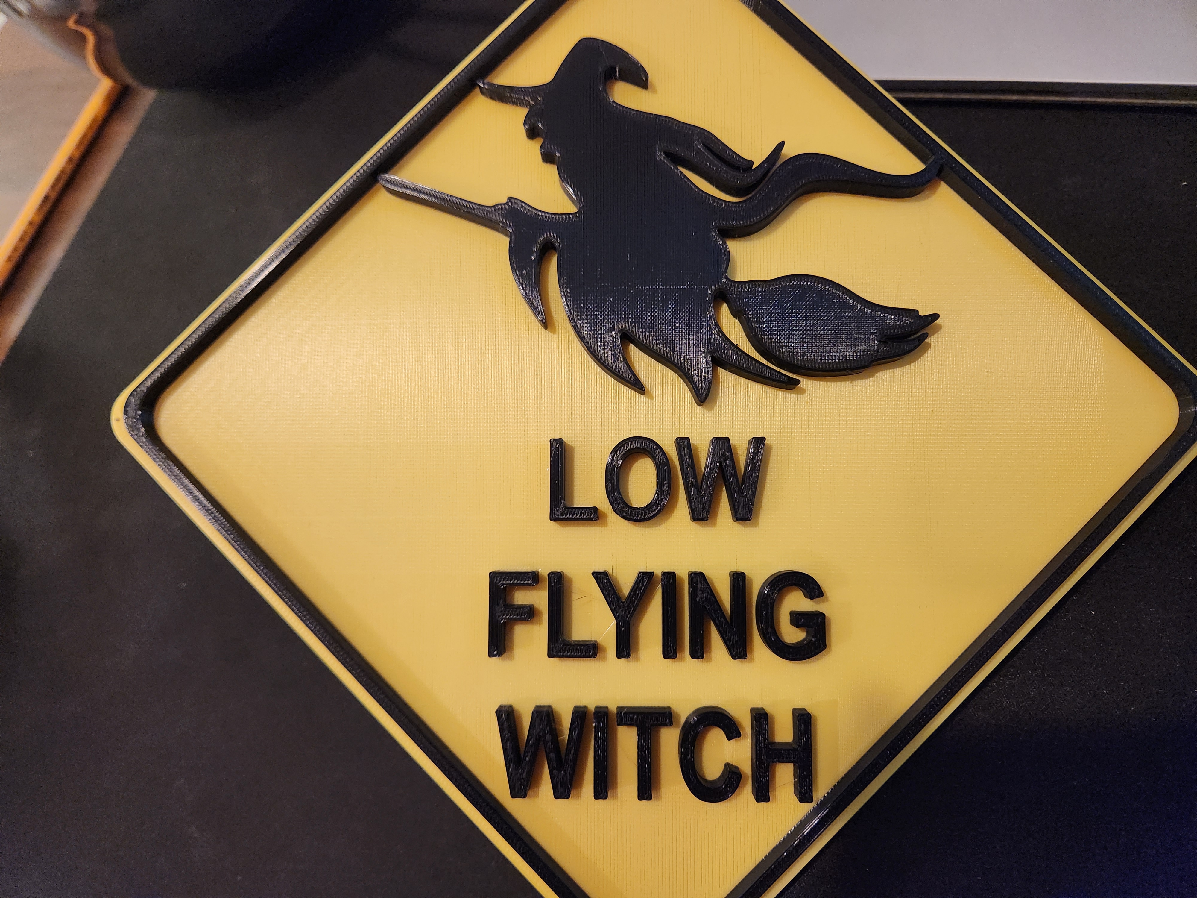 Low Flying Witch Sign