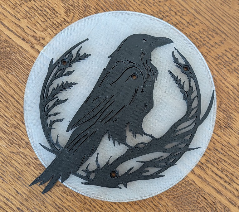 Round background or moon to back Crow and Raven mounted outlines