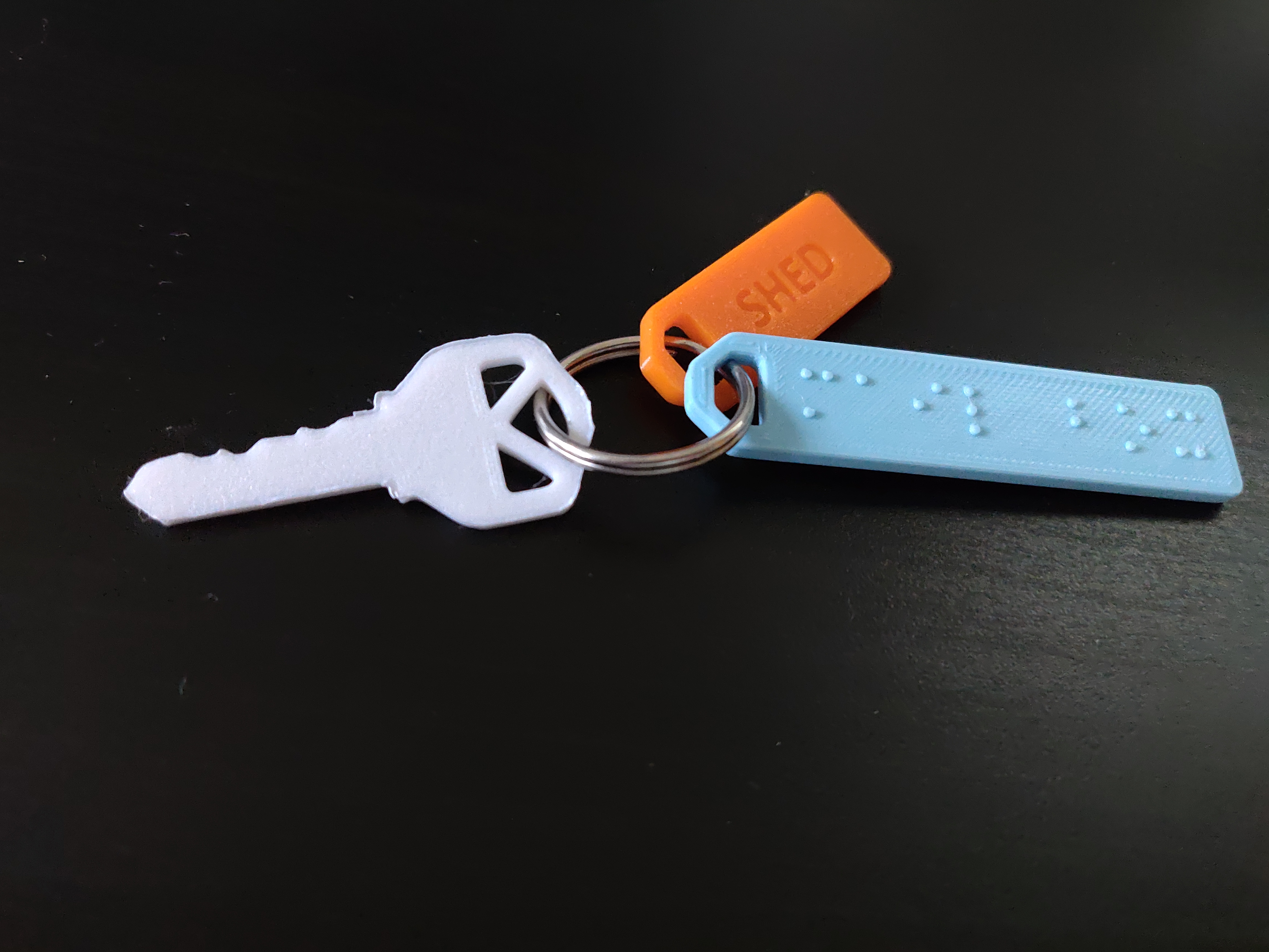 Braille key tags with regular English