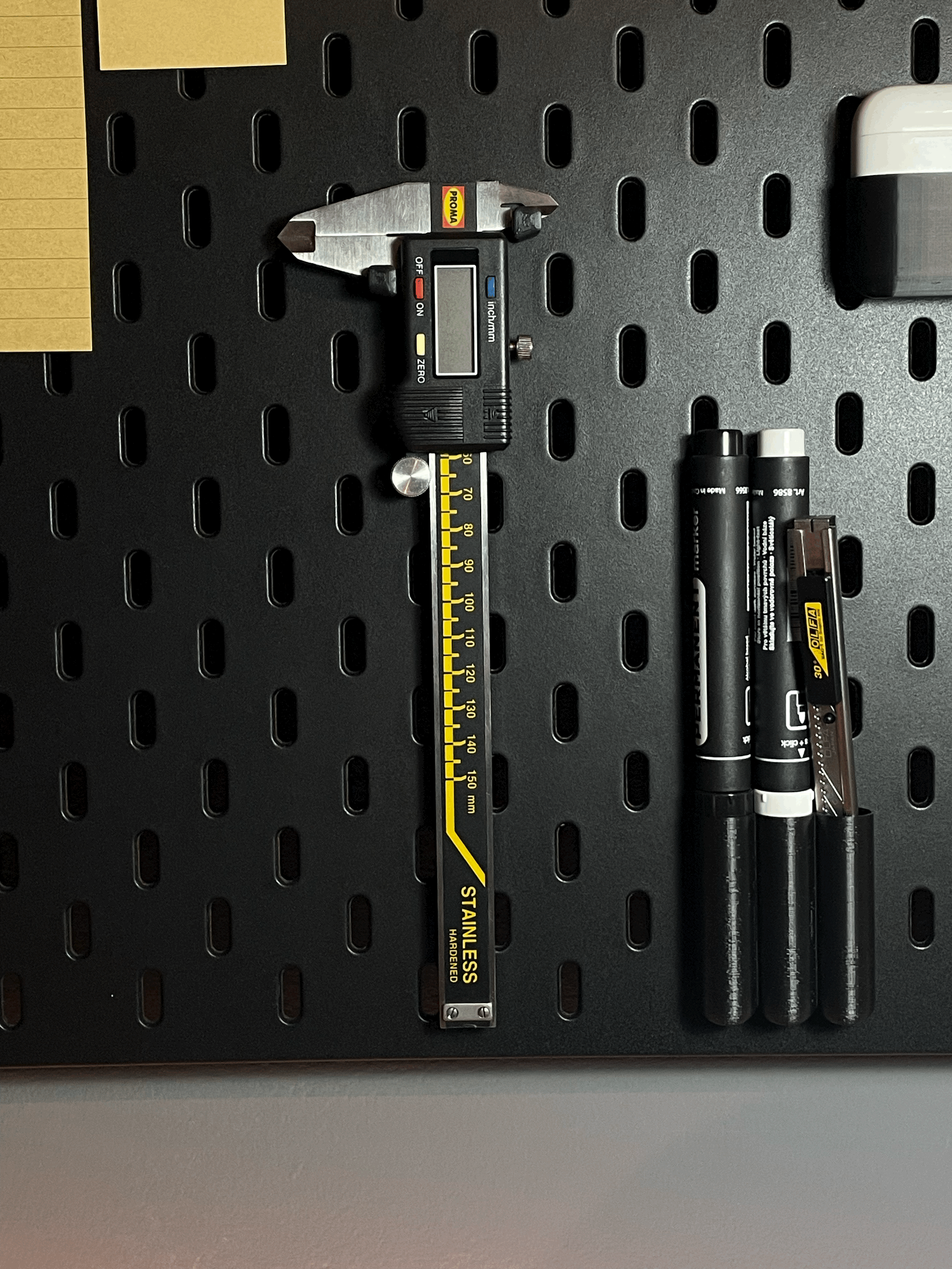 SKADIS Caliper holder