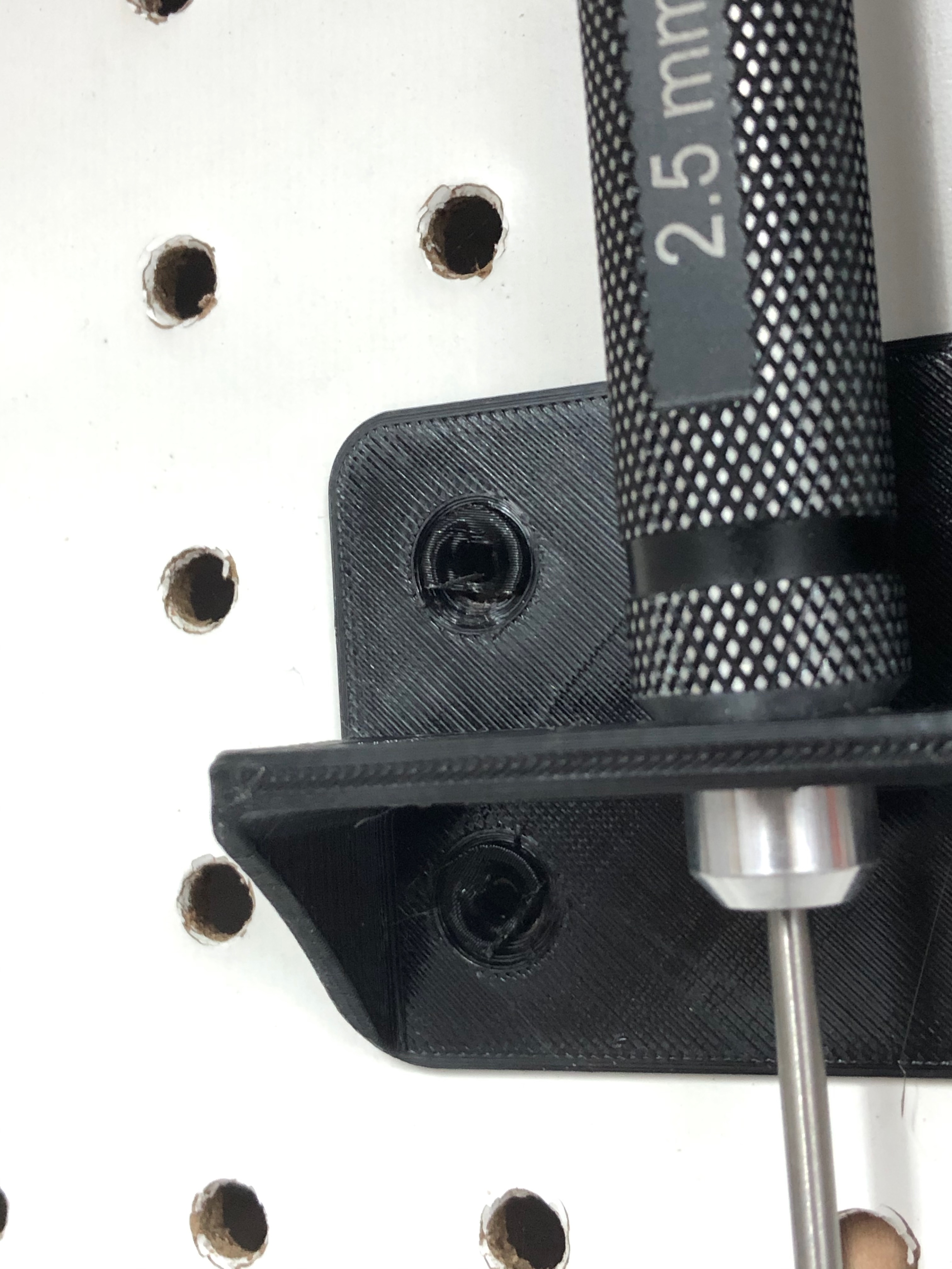 Hex driver holder for pegboard rivets by whoppingpochard Download