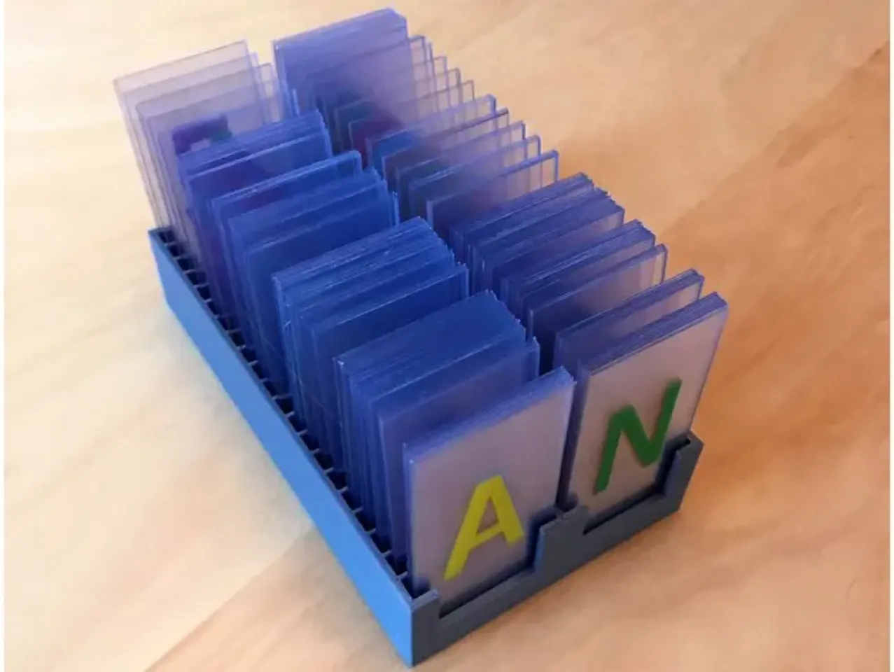 Keep you lovely lightbox letters stored and sorted in a business card  holder.