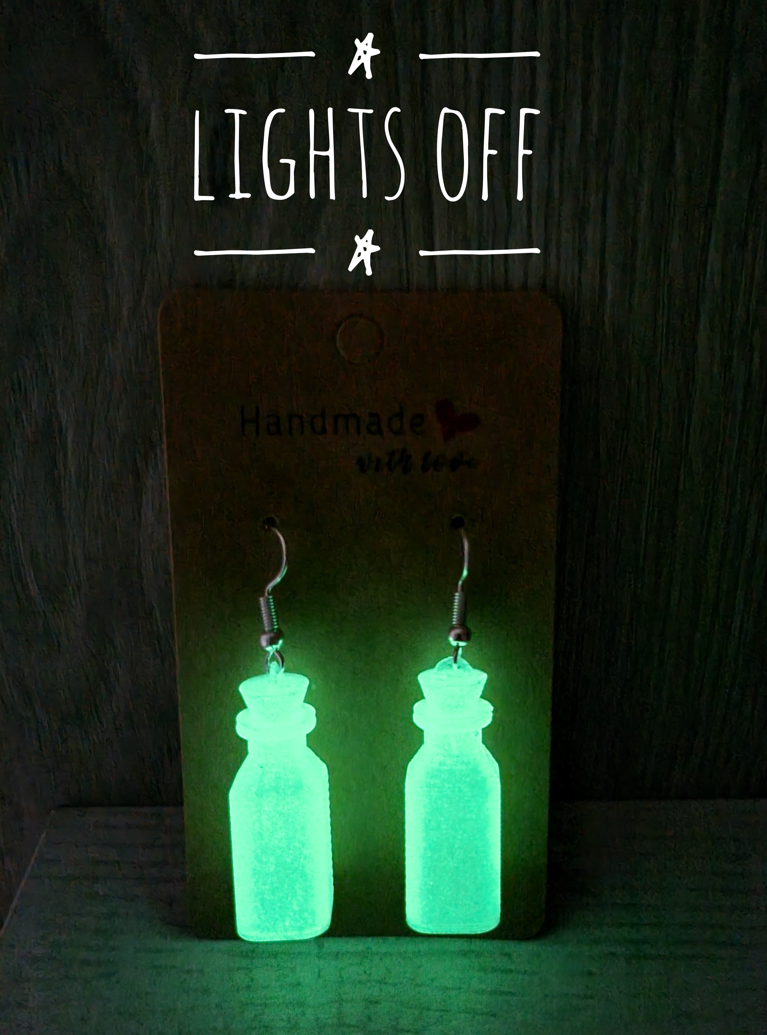 Glowing magic spell bottle earrings
