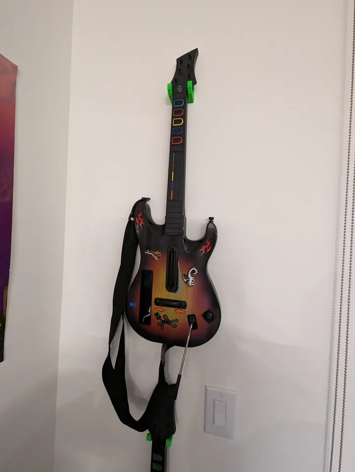 Strong Guitar Hero Wall Mount by Collin Ostrowski Download free STL model Printables