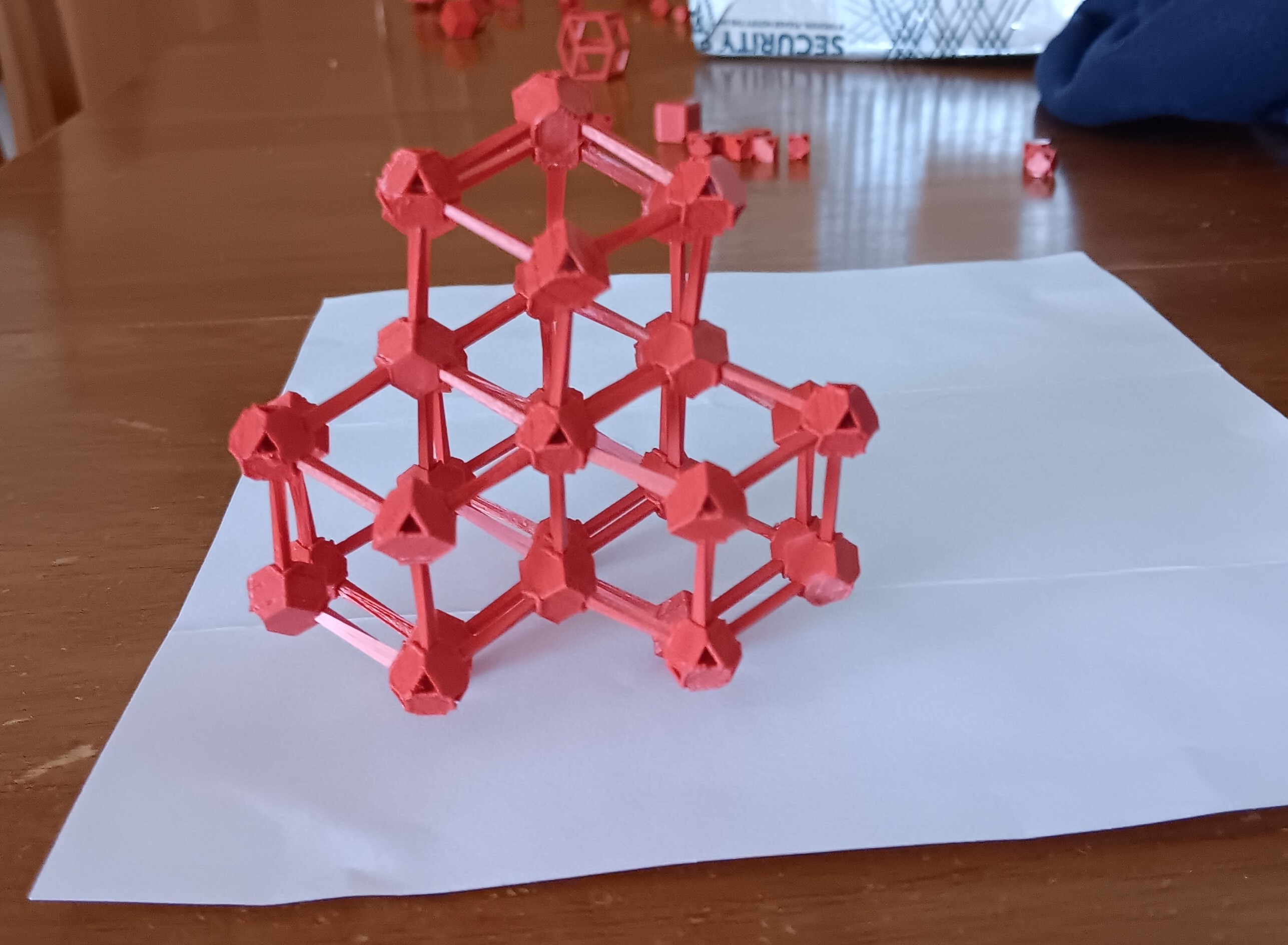 Ball and stick components for rhombic dodecahedron packing