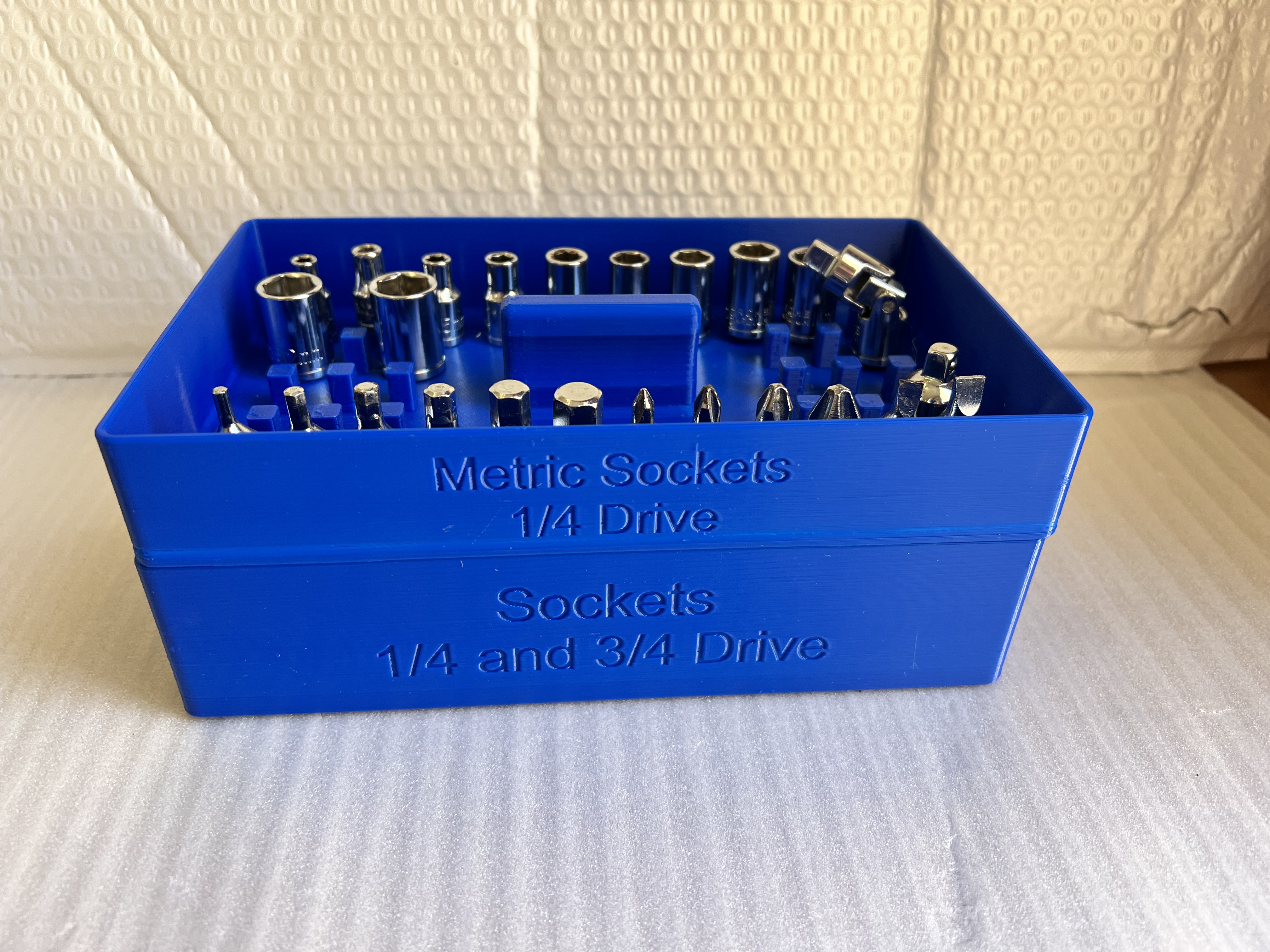 Stackable socket trays