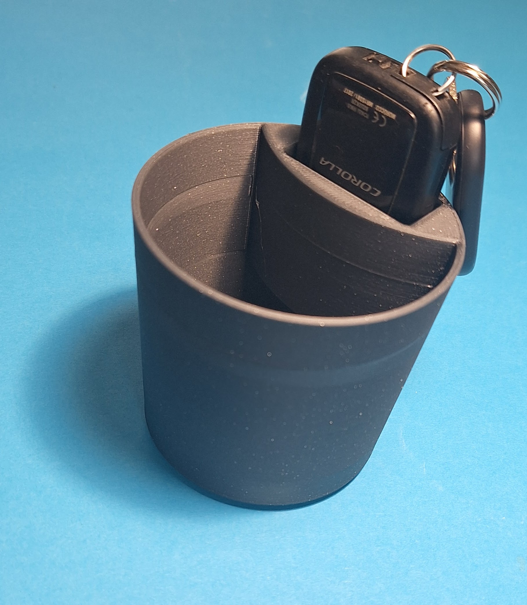 Toyota Corolla cup holder insert with carkey slot