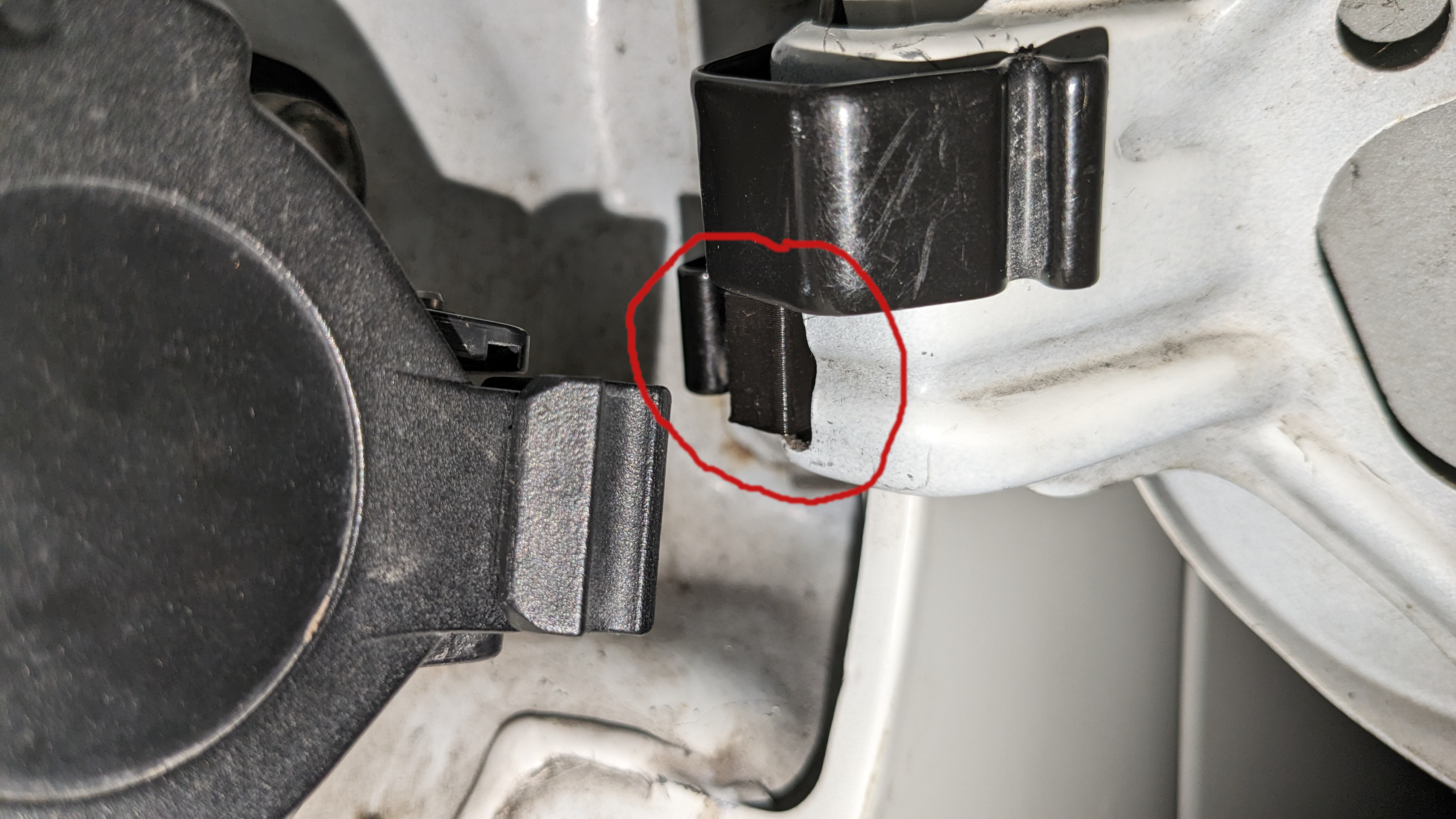 Spring support for charging socket cover