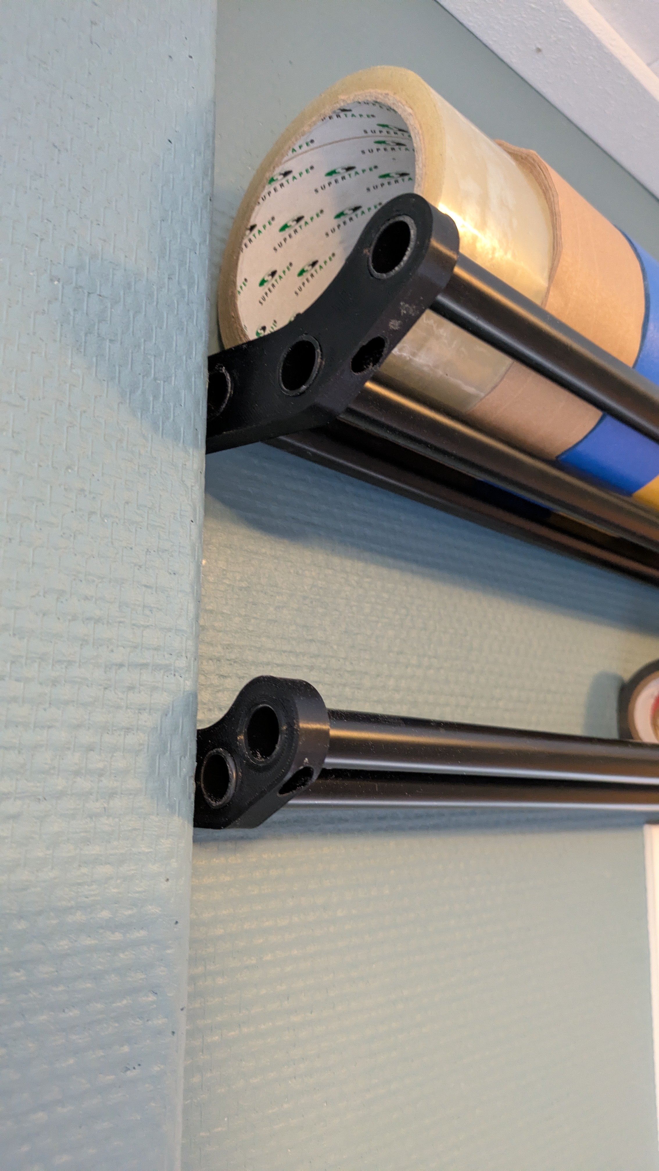 Tape wall bracket