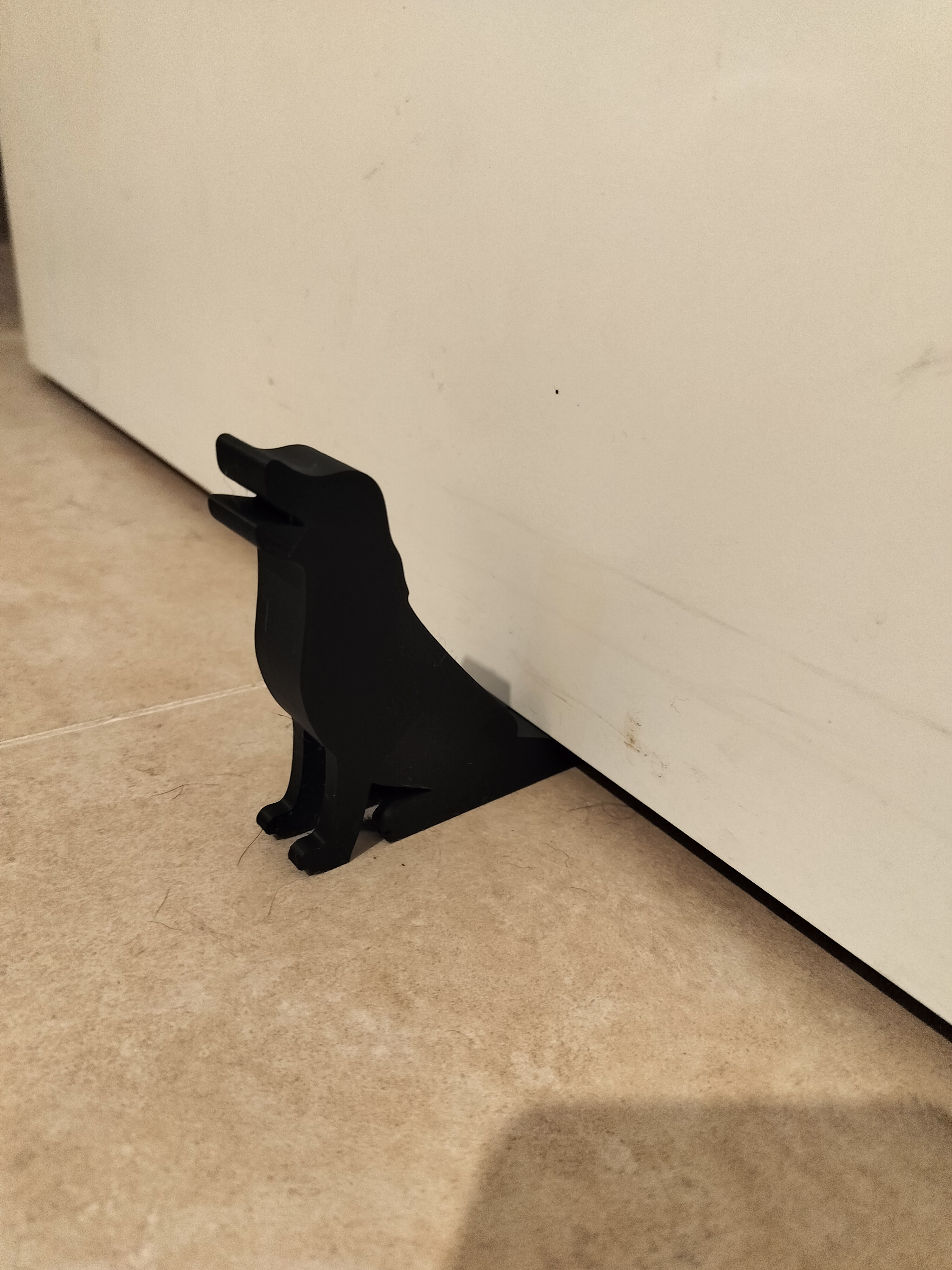 Dog doorstop