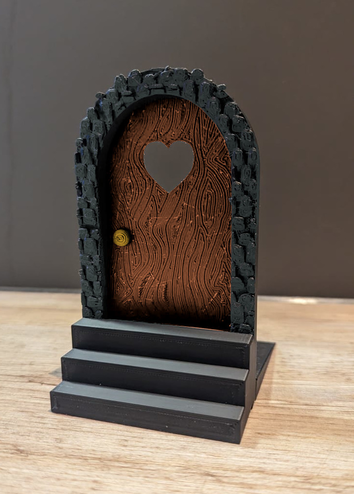 Doorstop with fairy door in two versions