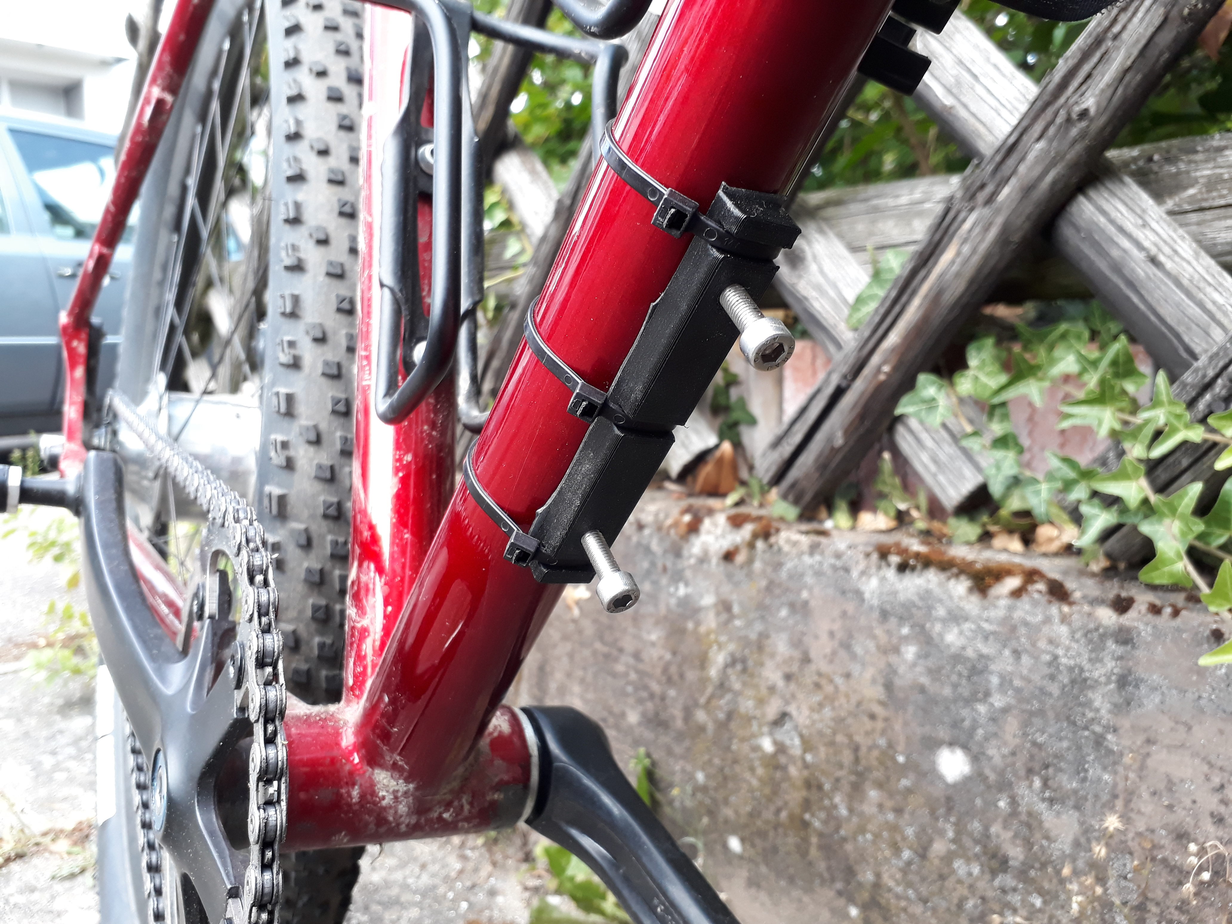 Bikepacking strap on bottle cage mount