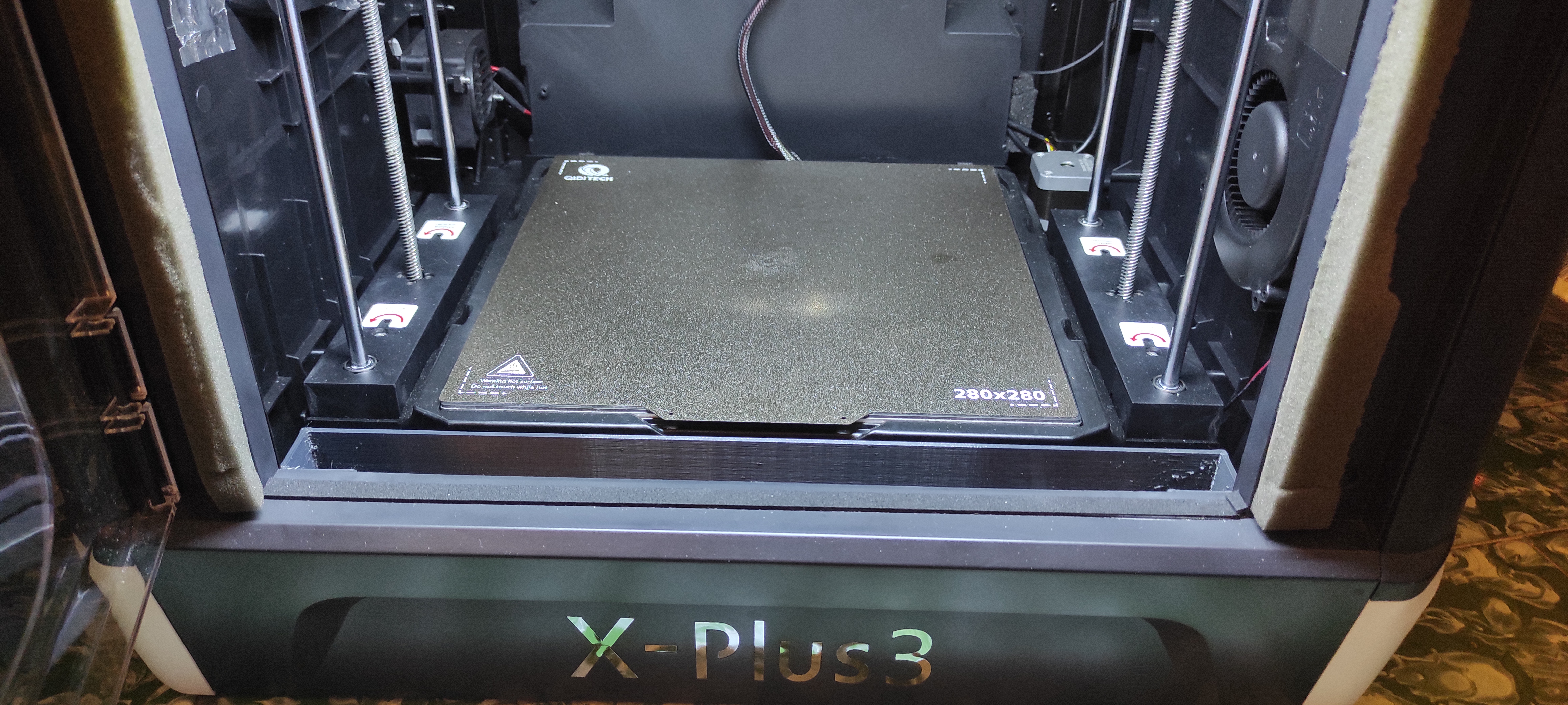 Installation of trash container in the QIDI TECH X-Plus 3 3D Printer