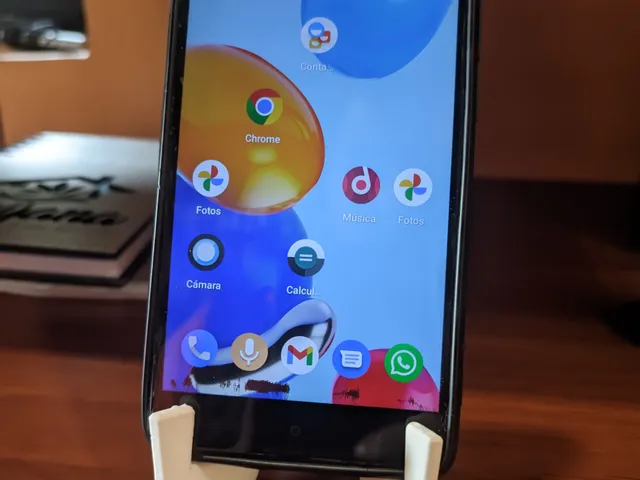 Foldable Phone stand. Print in place with keychain ring