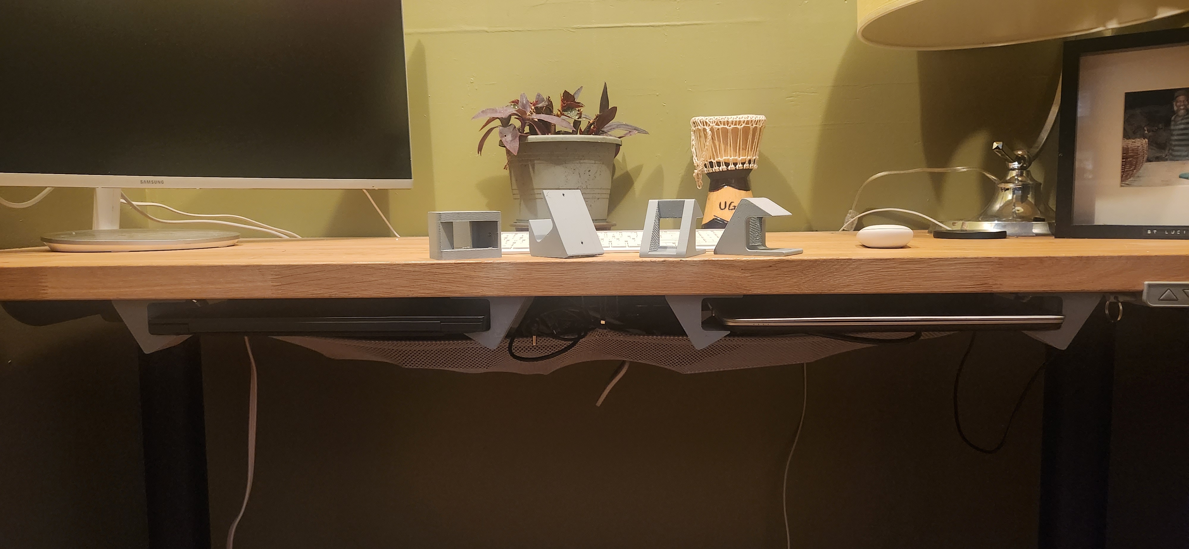 Underdesk laptop holder with hole