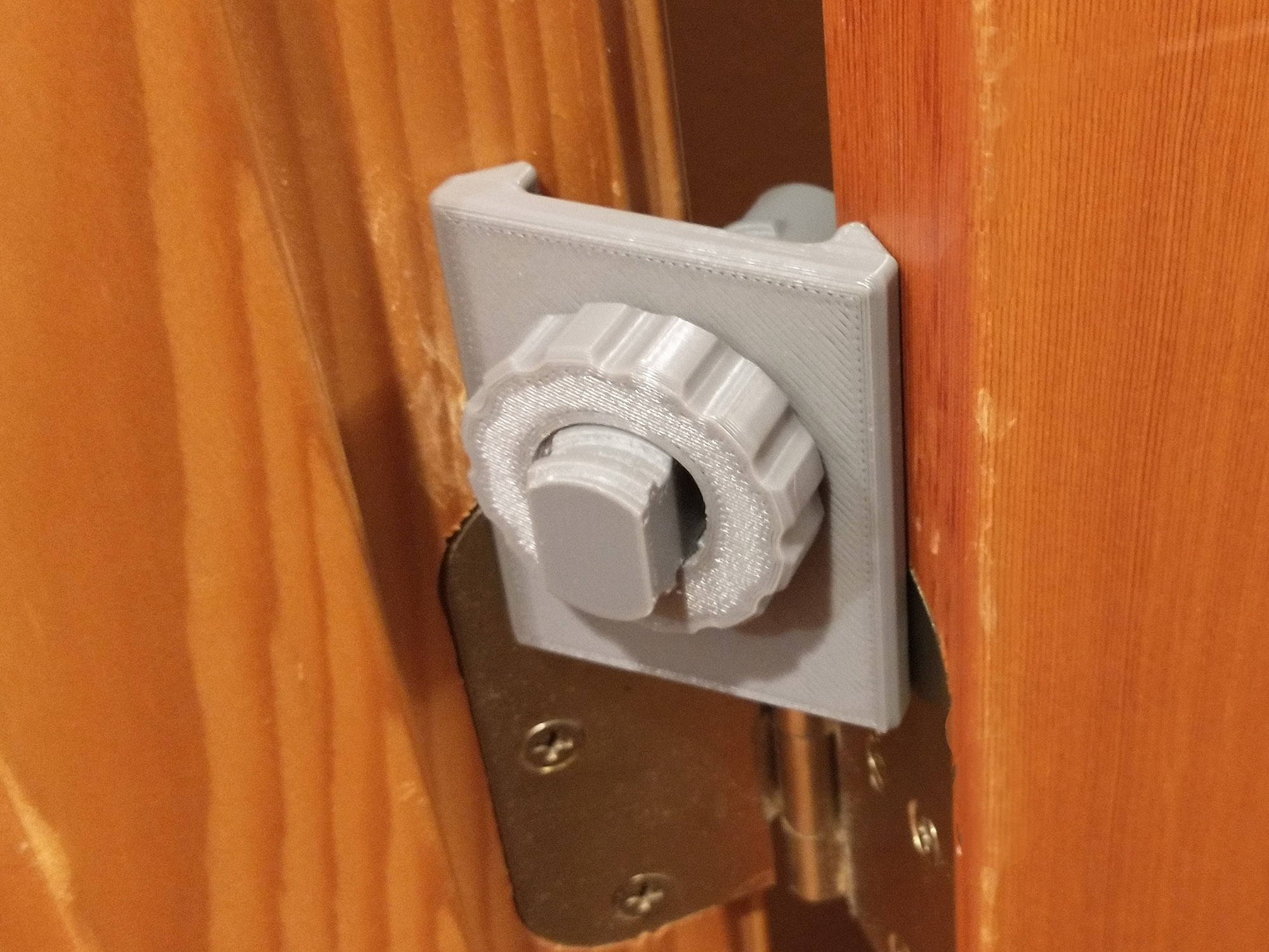 Adjustable Hinge-Clip Doorstop