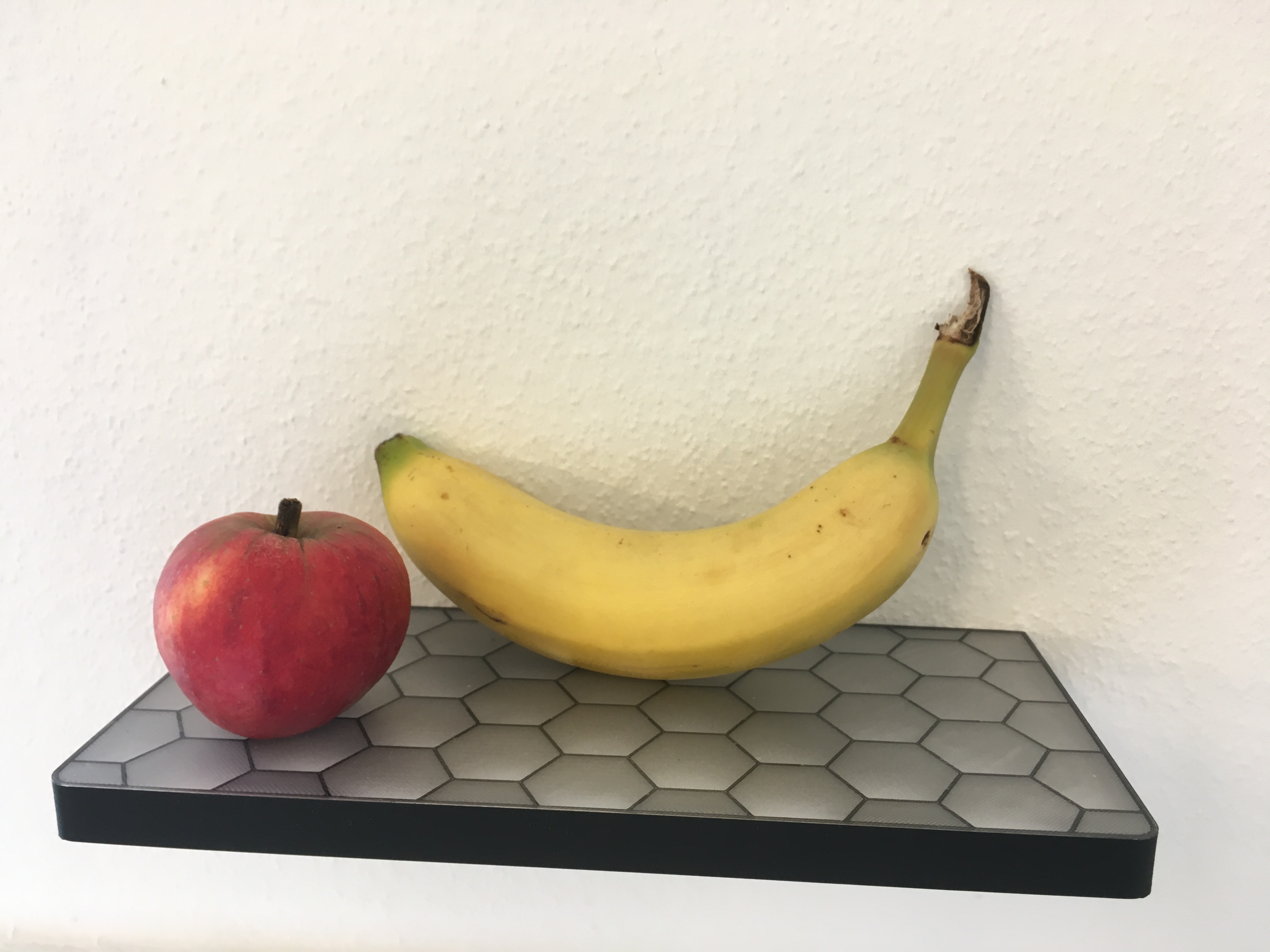 wallmount shelf with visible hexagon infill