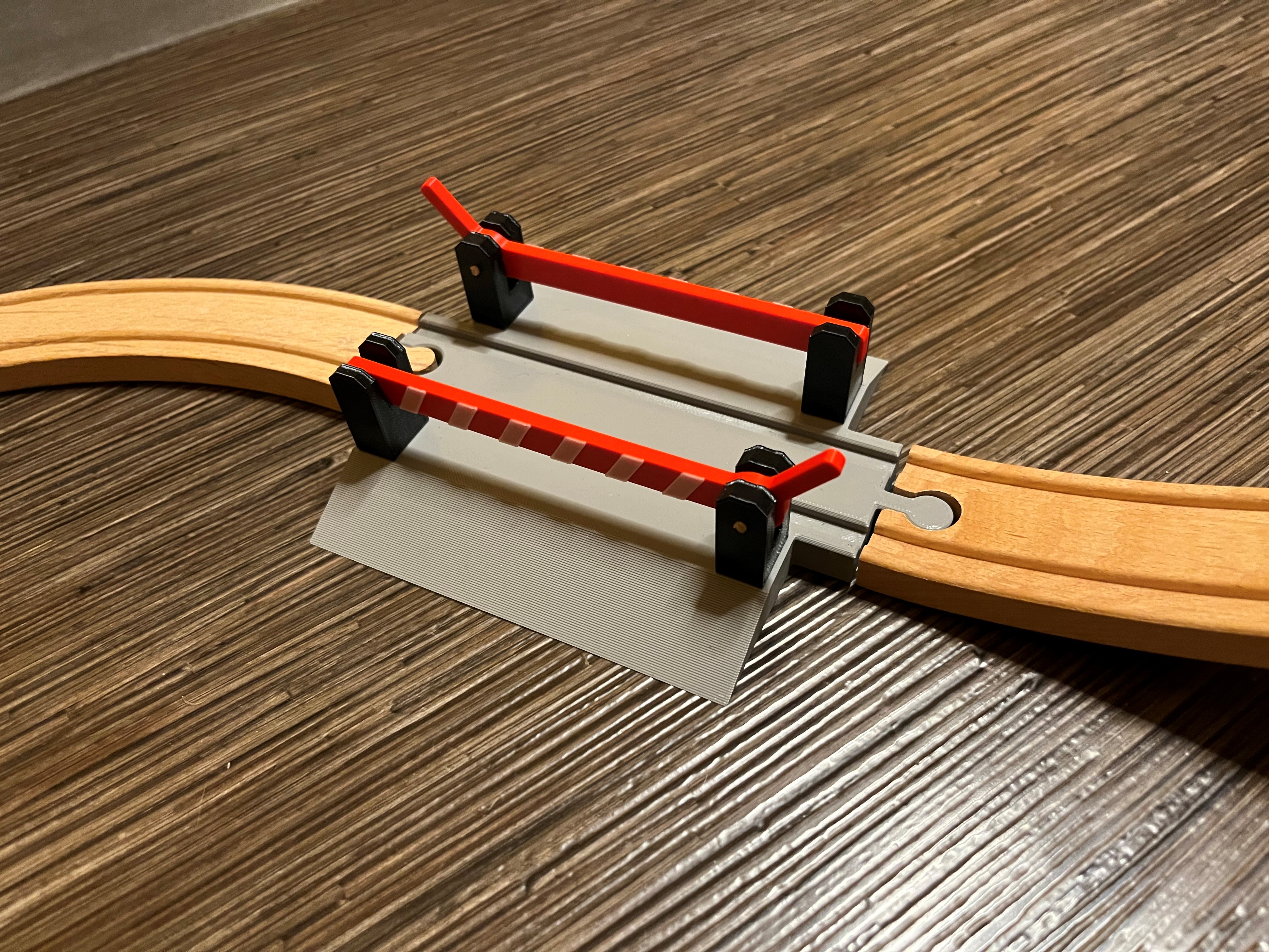 Railway crossing with barriers