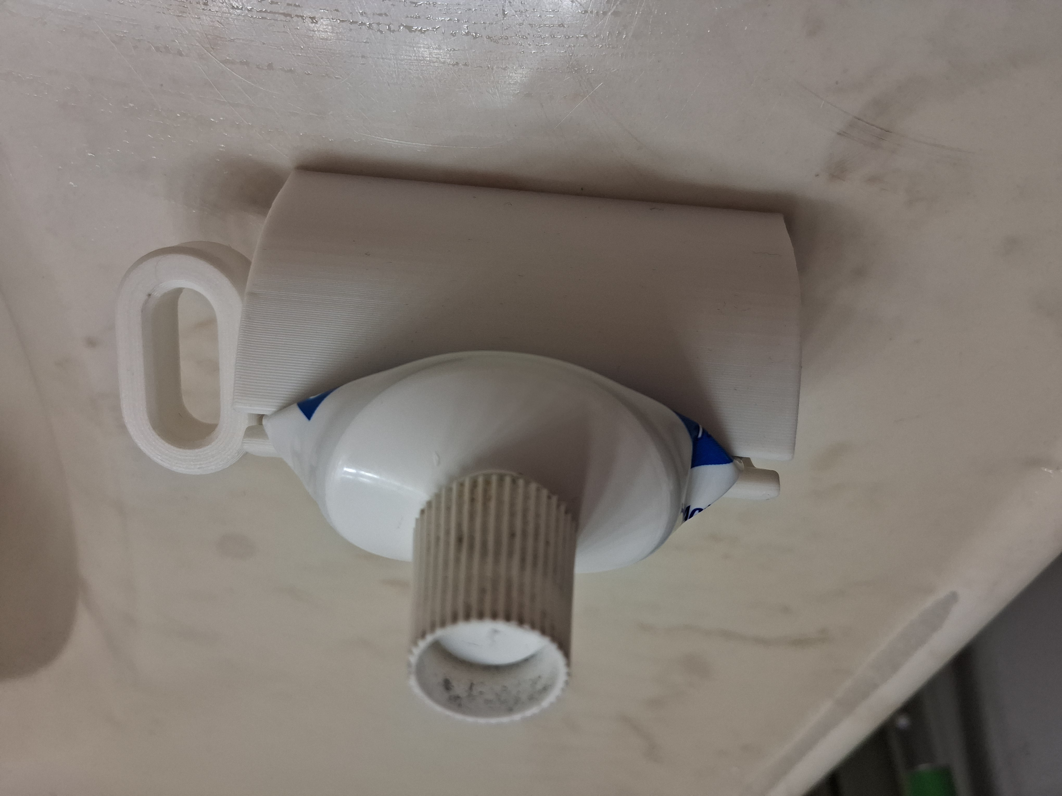 Toothpaste squeeze holder remix