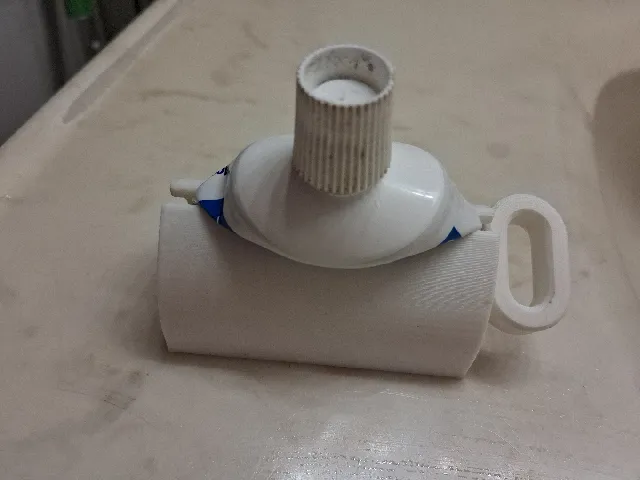 Toothpaste squeeze holder remix