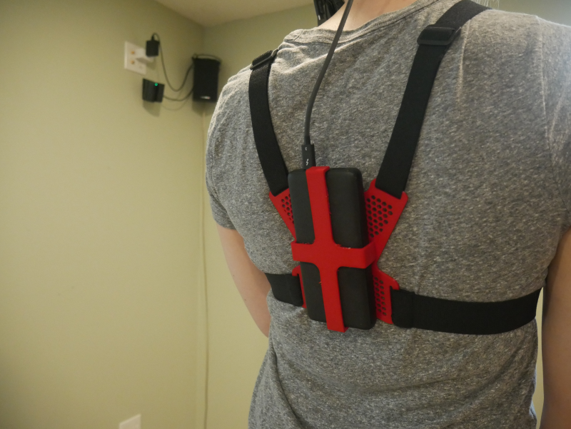 Chest tracker battery mount for wireless VR