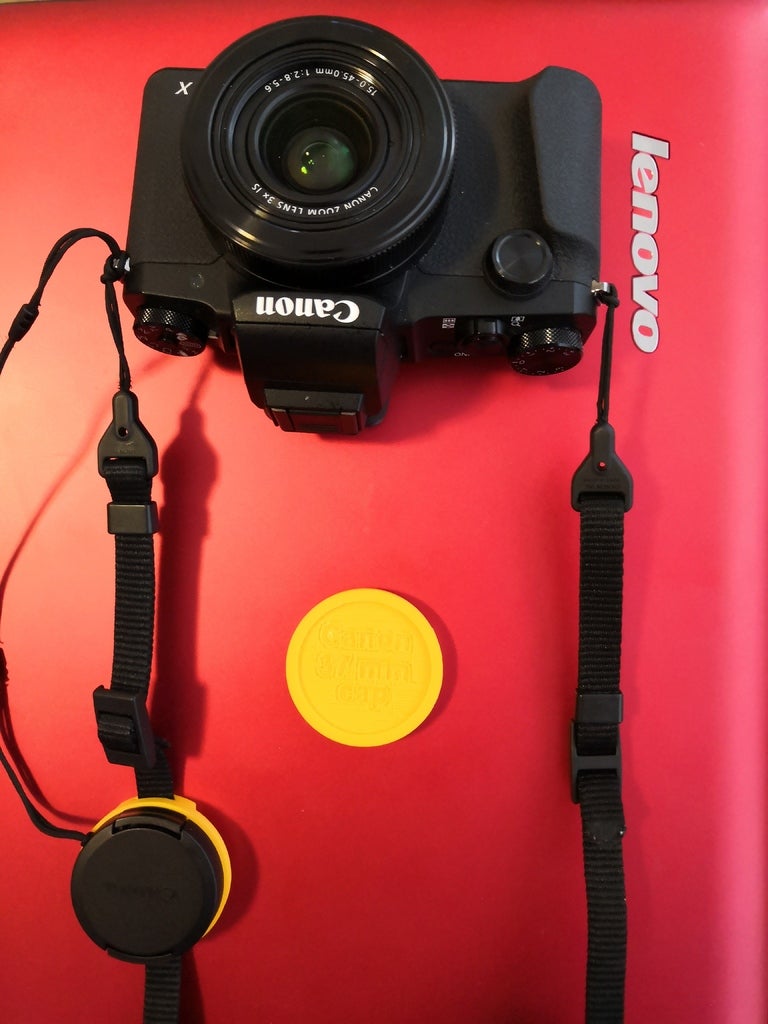 Canon camera 37mm cap strap holder