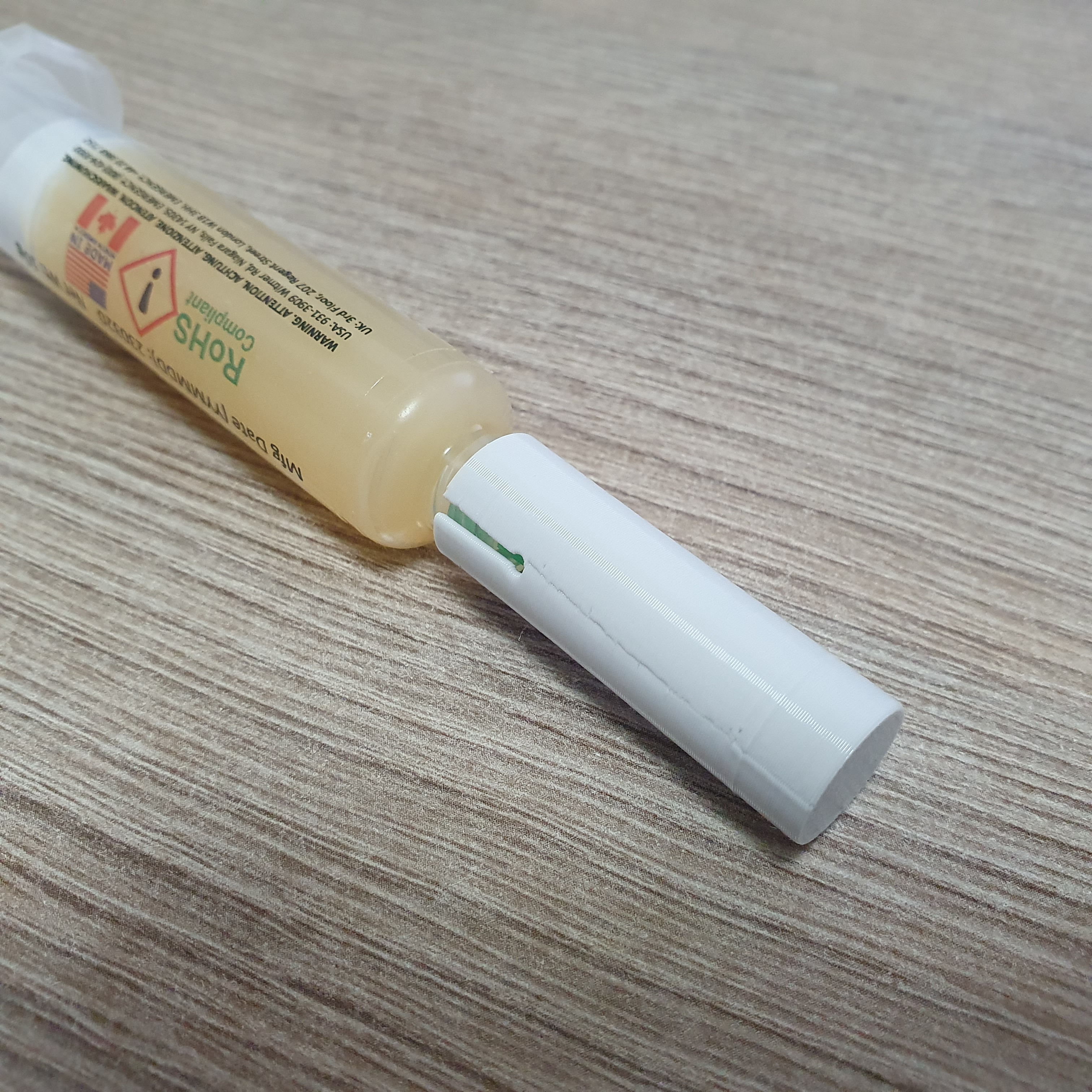 Flux syringe cap