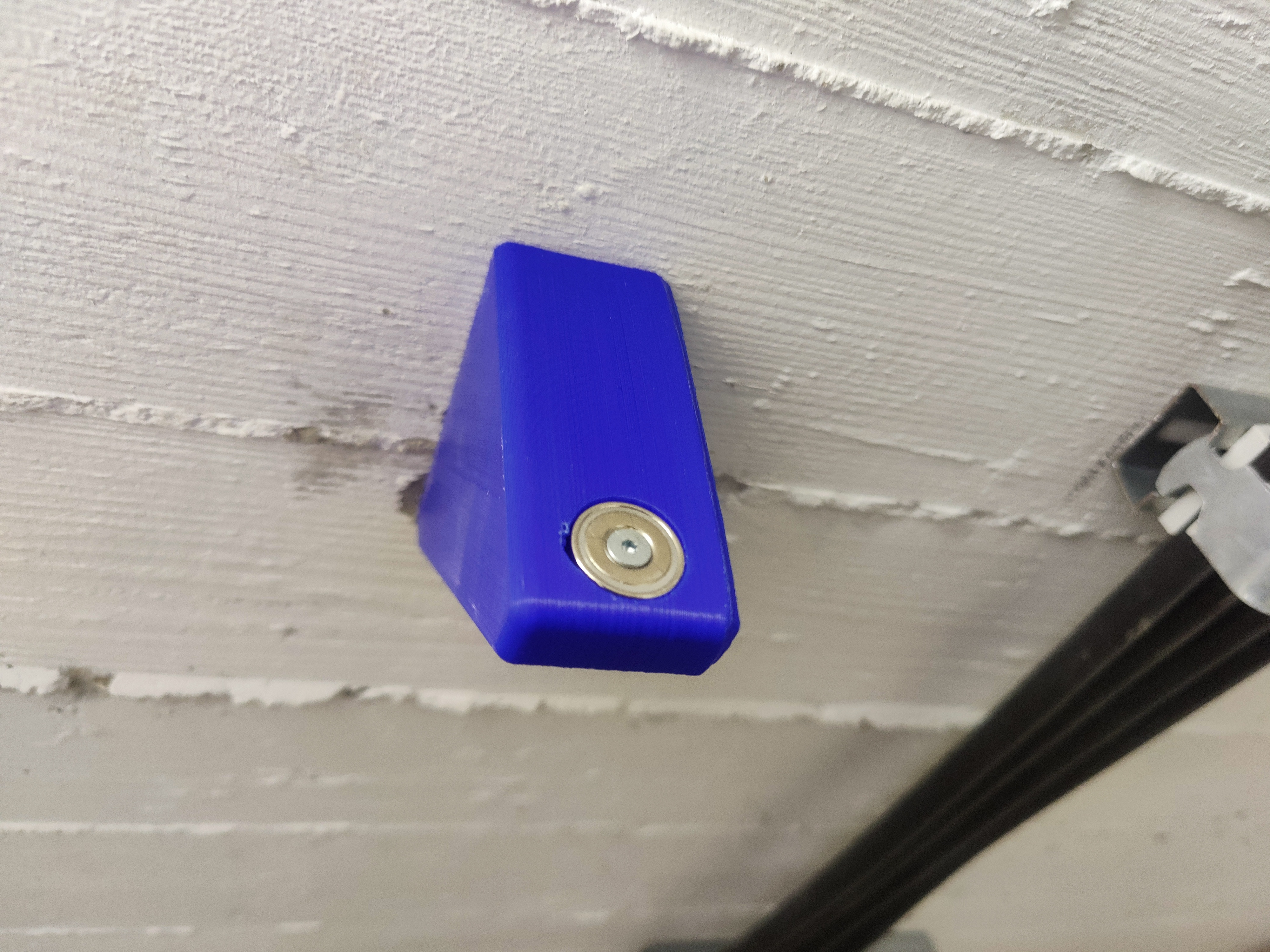Türstopper mit magnetischem Halter [Doorstop with magnetic holder]