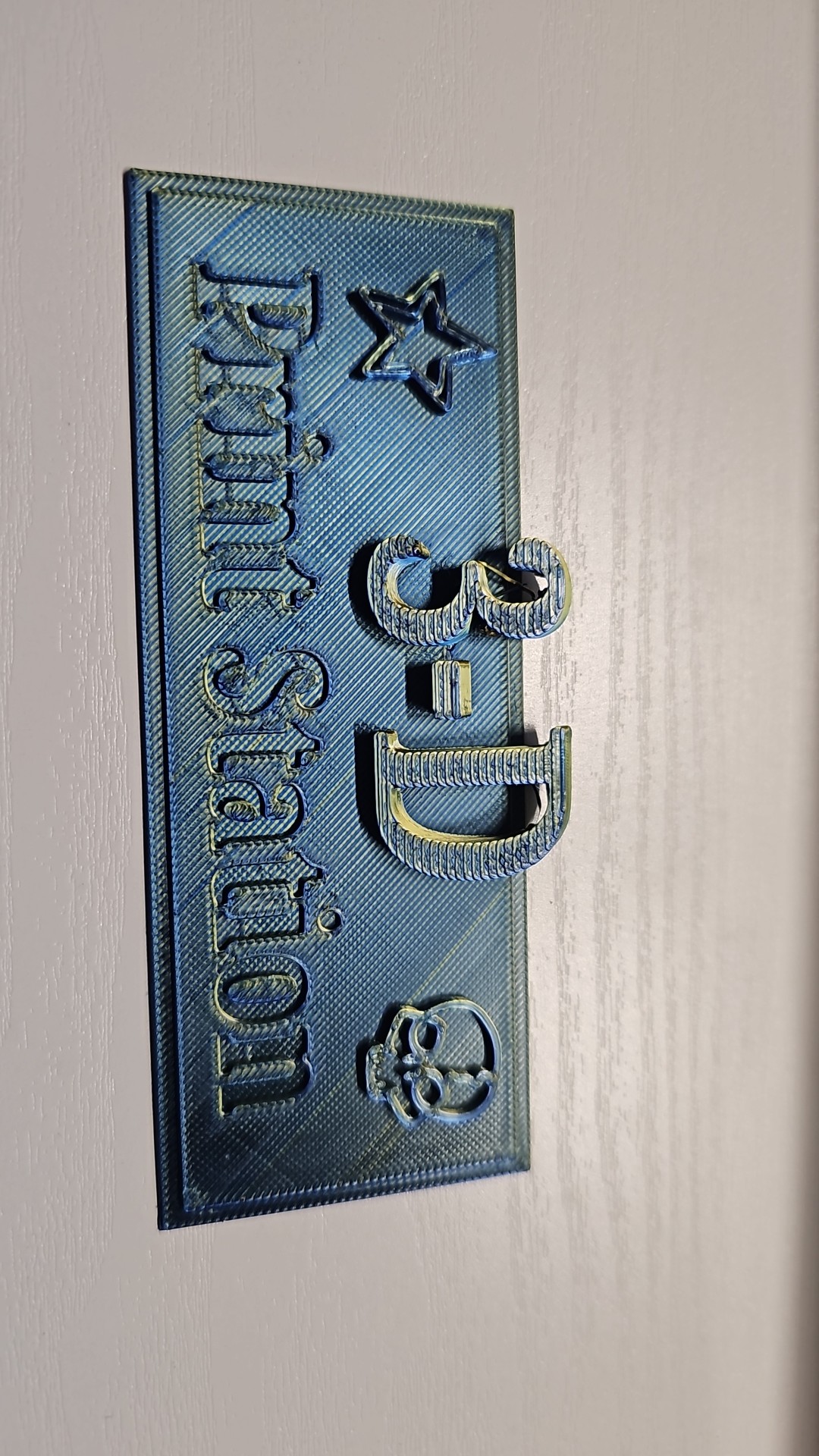 Printer station sign