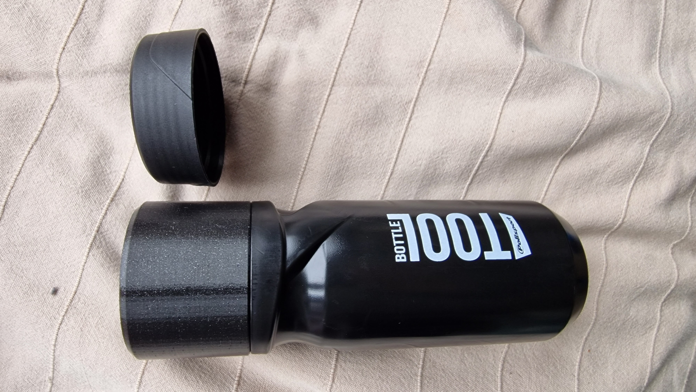 Bike tool bottle extended lid