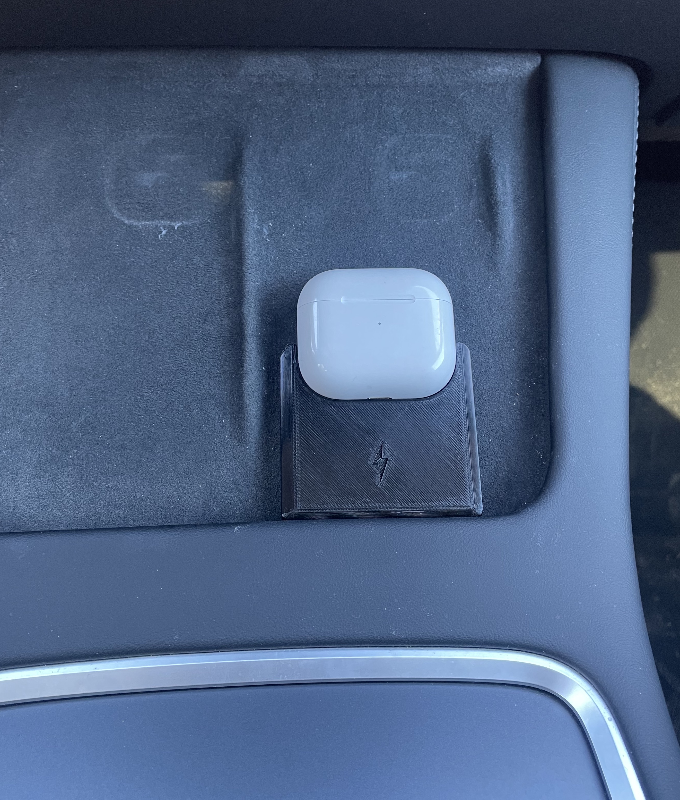 Tesla Model Y AirPods wireless charging adapter