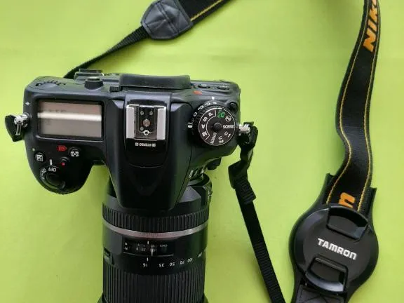 Lens cap holder for 67 mm lens