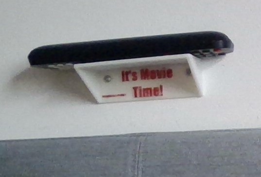 Wall remote holder