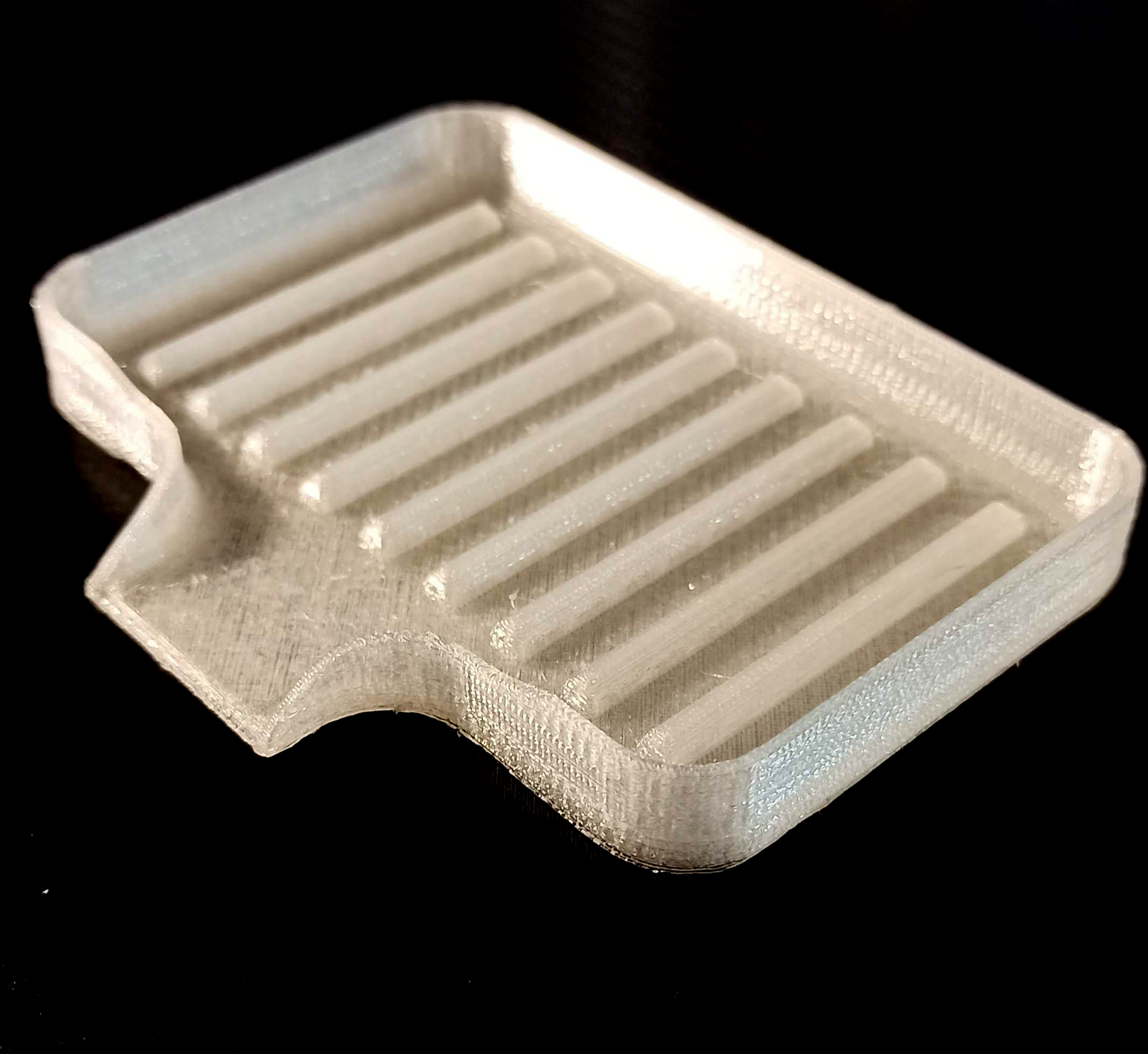 Soap dish with a drain.