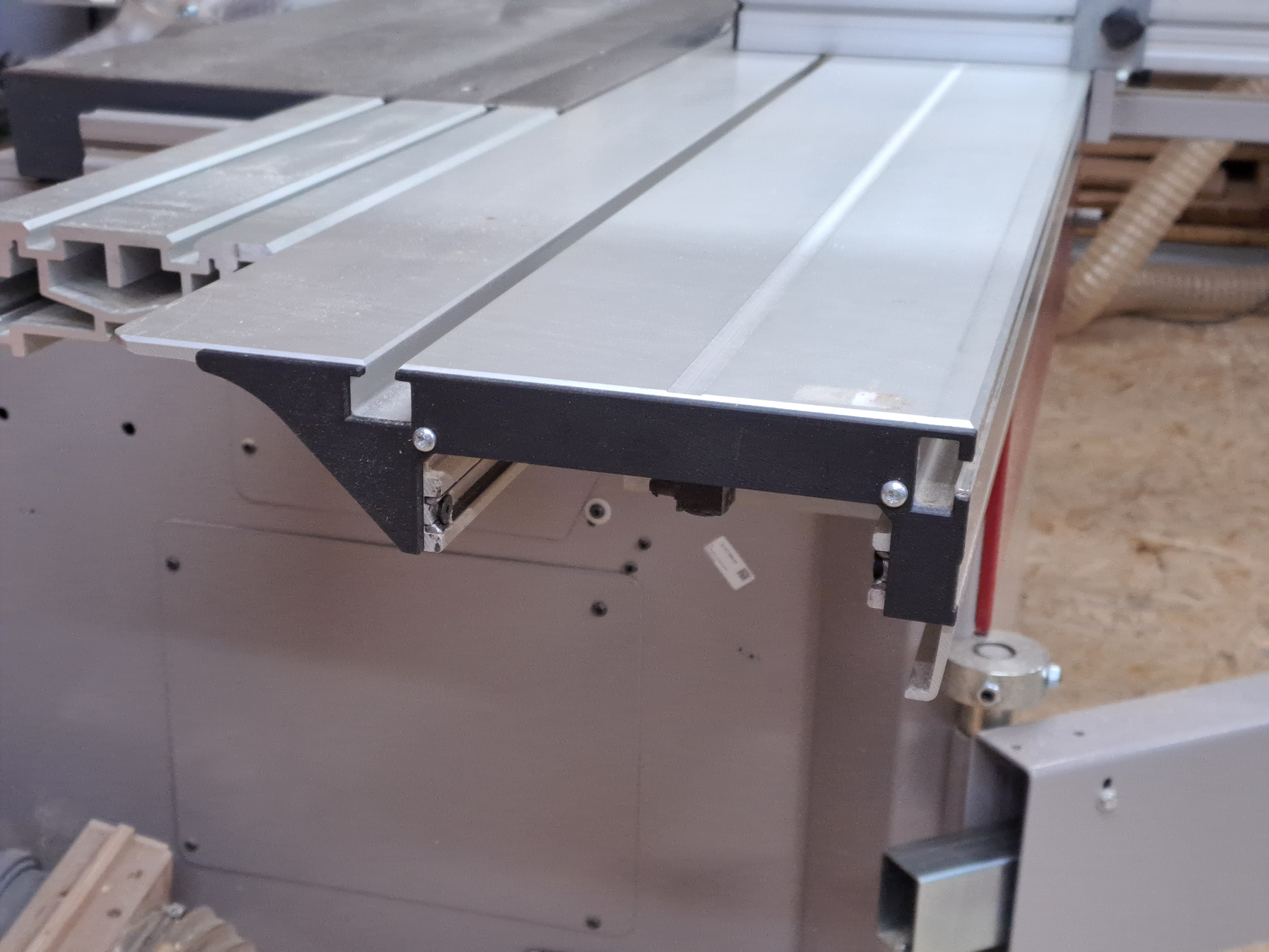 Hammer sliding table end cap