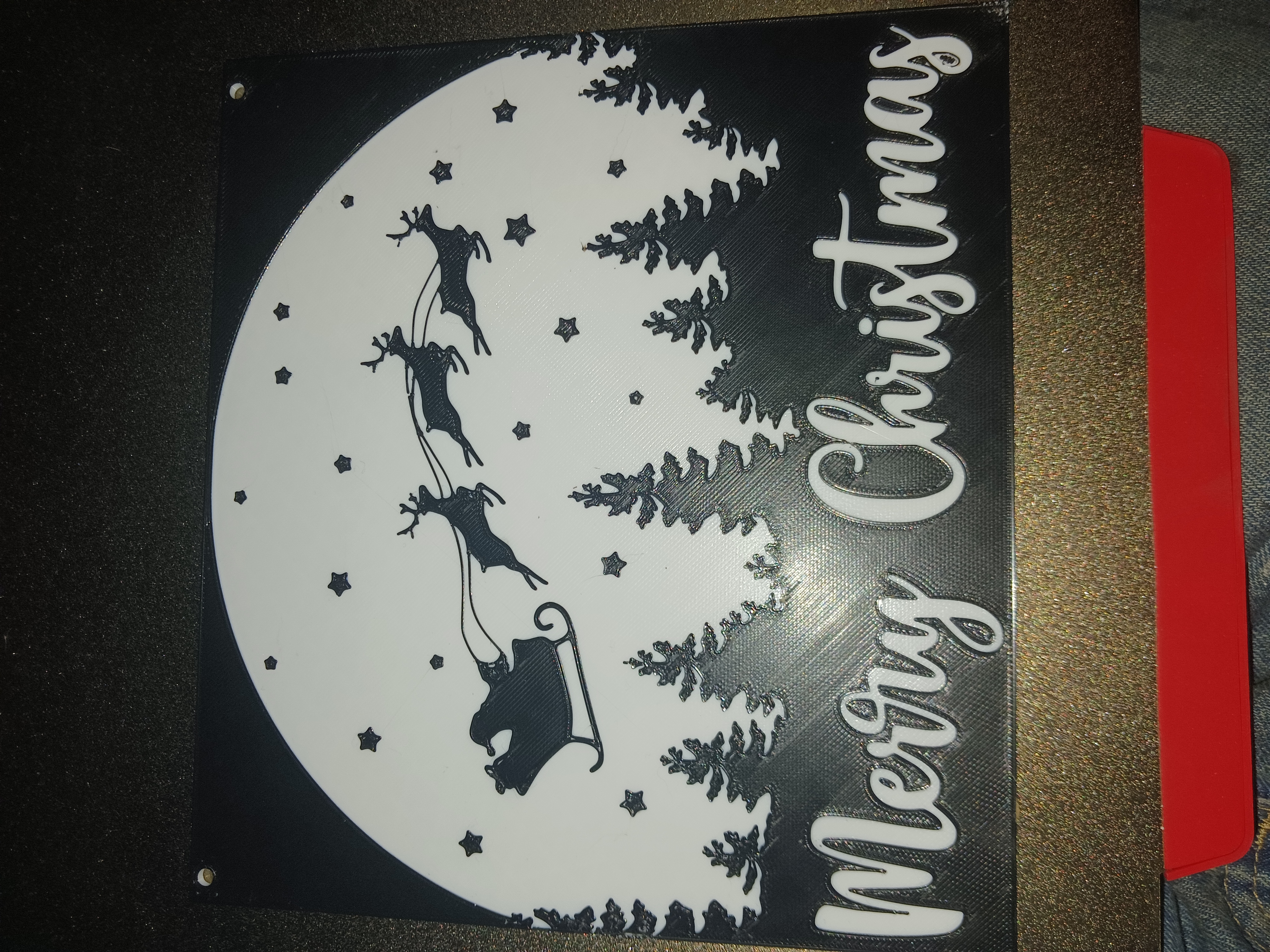 merry christmas logo with Santa flying silhouette