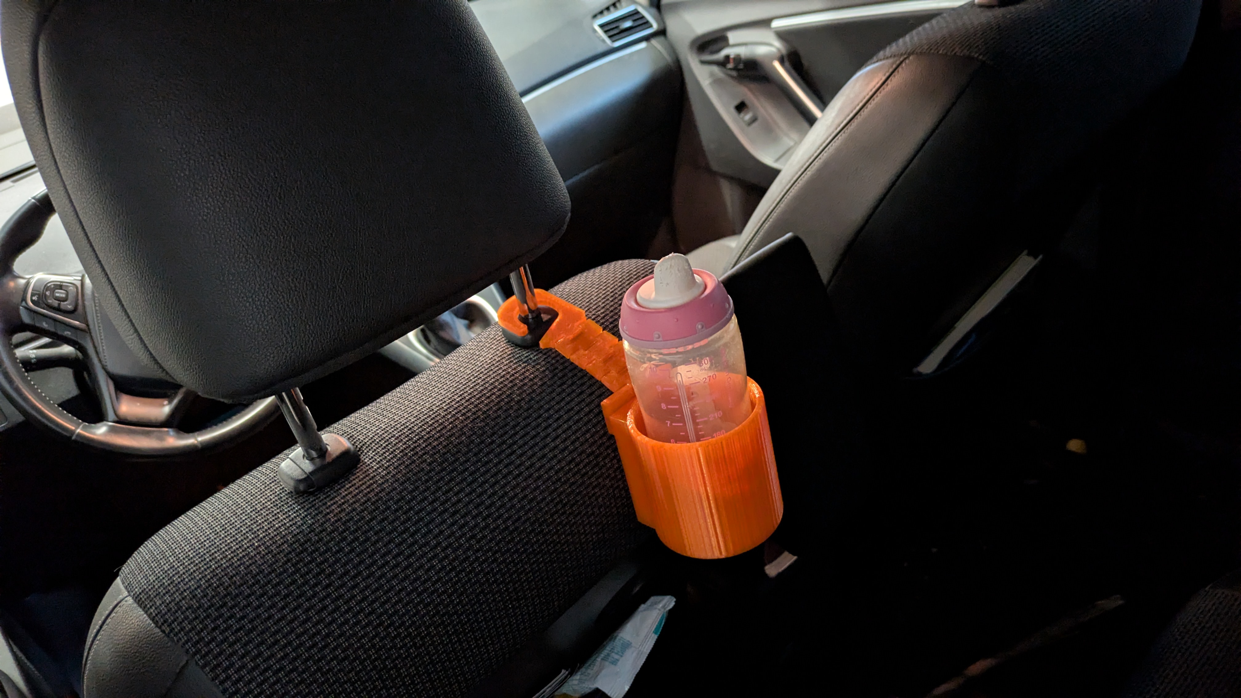 The Flexi bottle holder / Flexi canholder