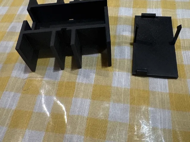 Dell laptop battery charger holder