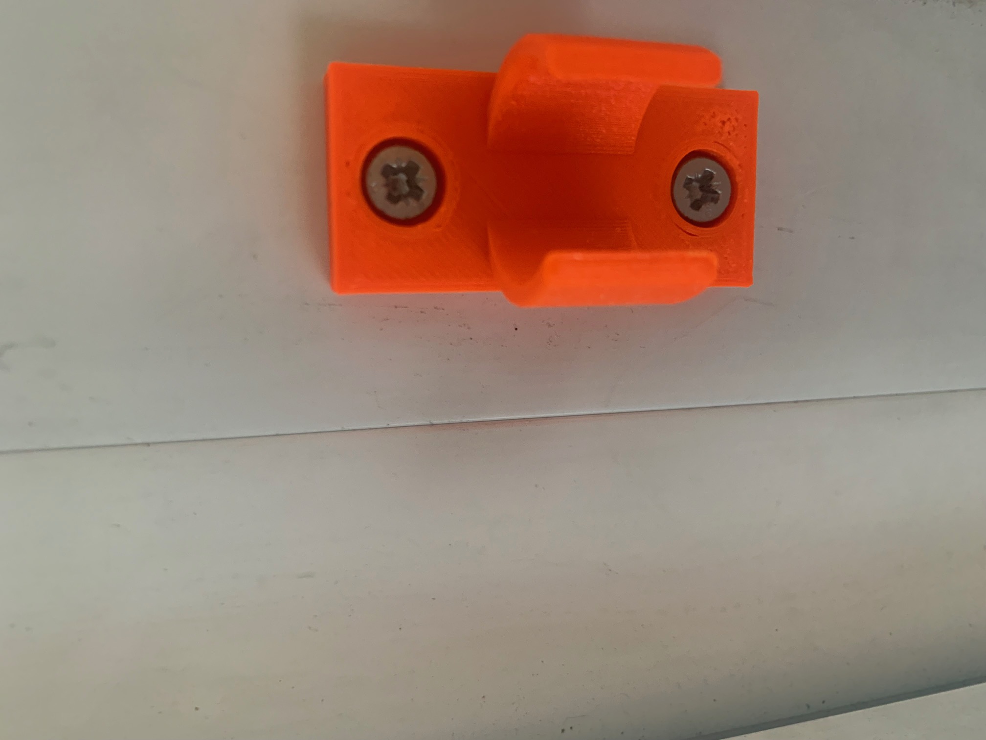 Sunshade (window shutters) crank holder bracket.