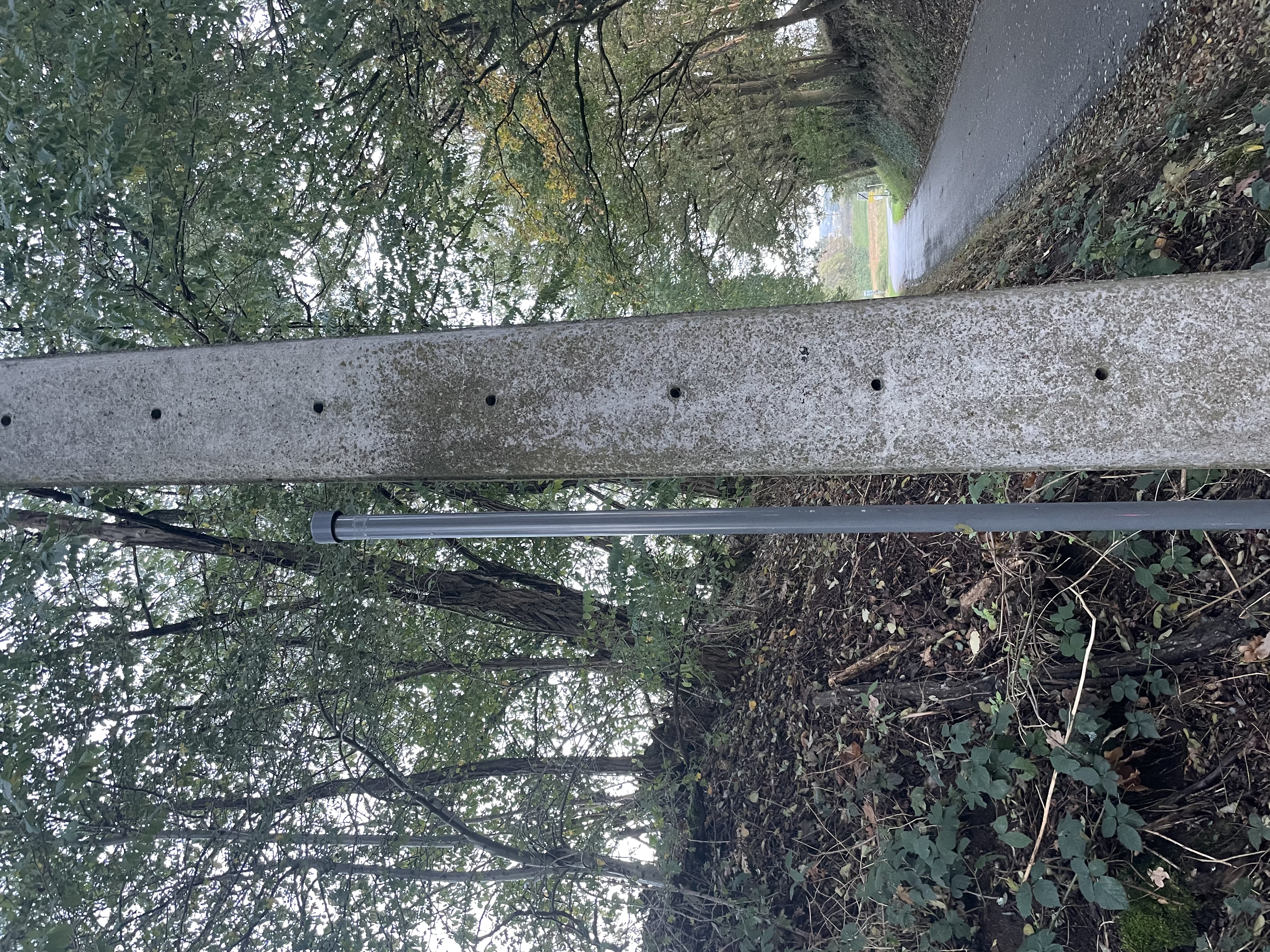 Geocache container - Road sign pole