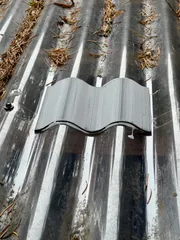 Corrugated roof repair panel
