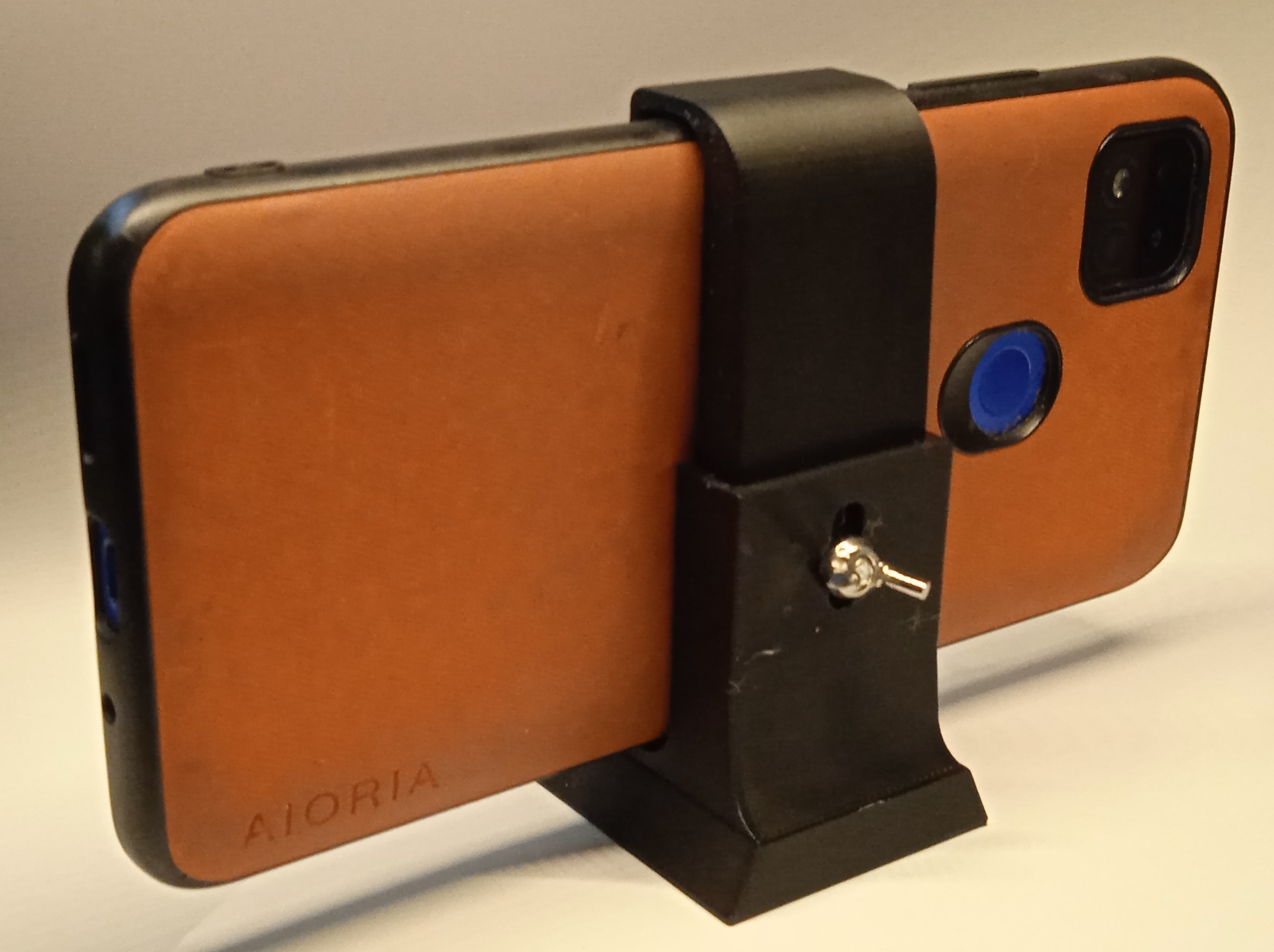 Phone camera to tripod adaptor