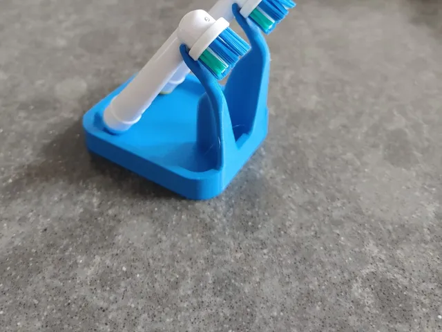 Toothbrush head holder