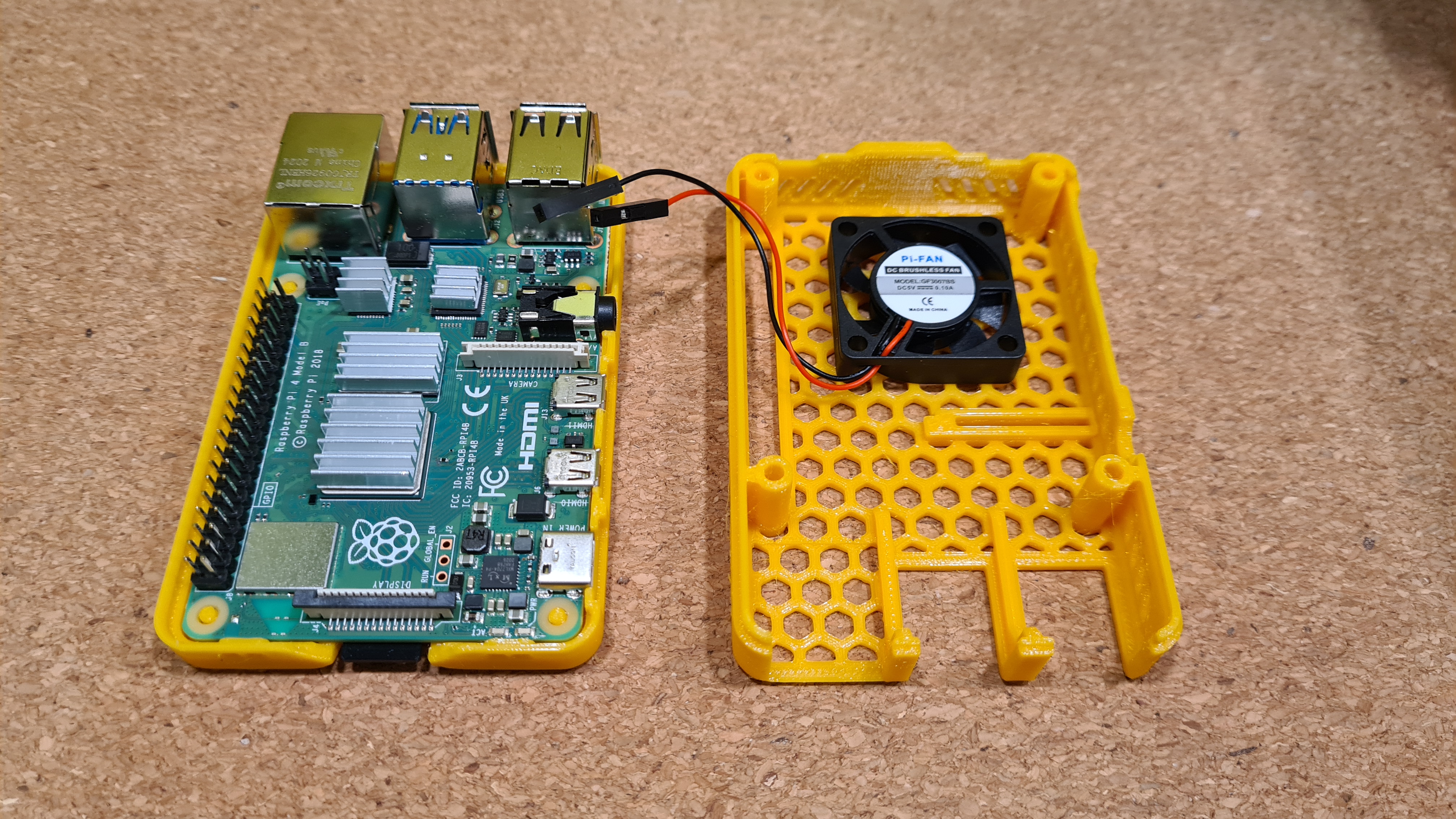 modified case for raspberry pi 4 with camera pi + GPIO pins + 30x30 mm fan