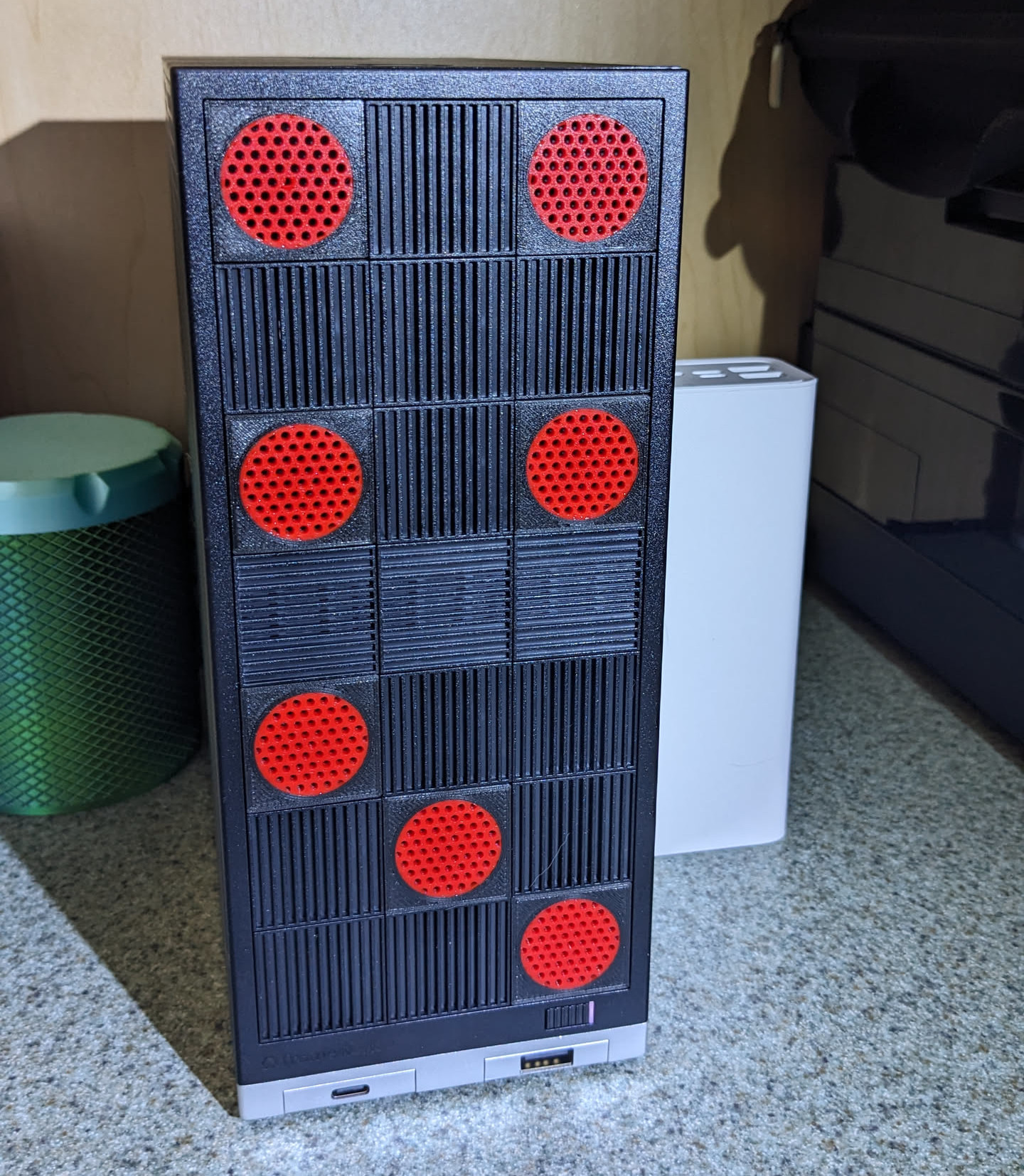 Framework Desktop Tile with Circular Pattern vents.