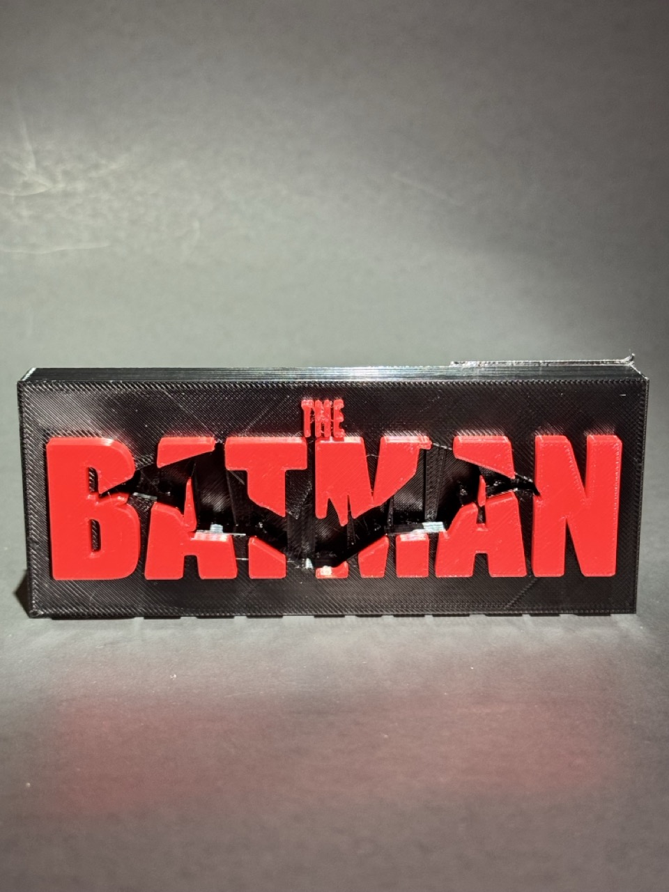 The Batman logo plate